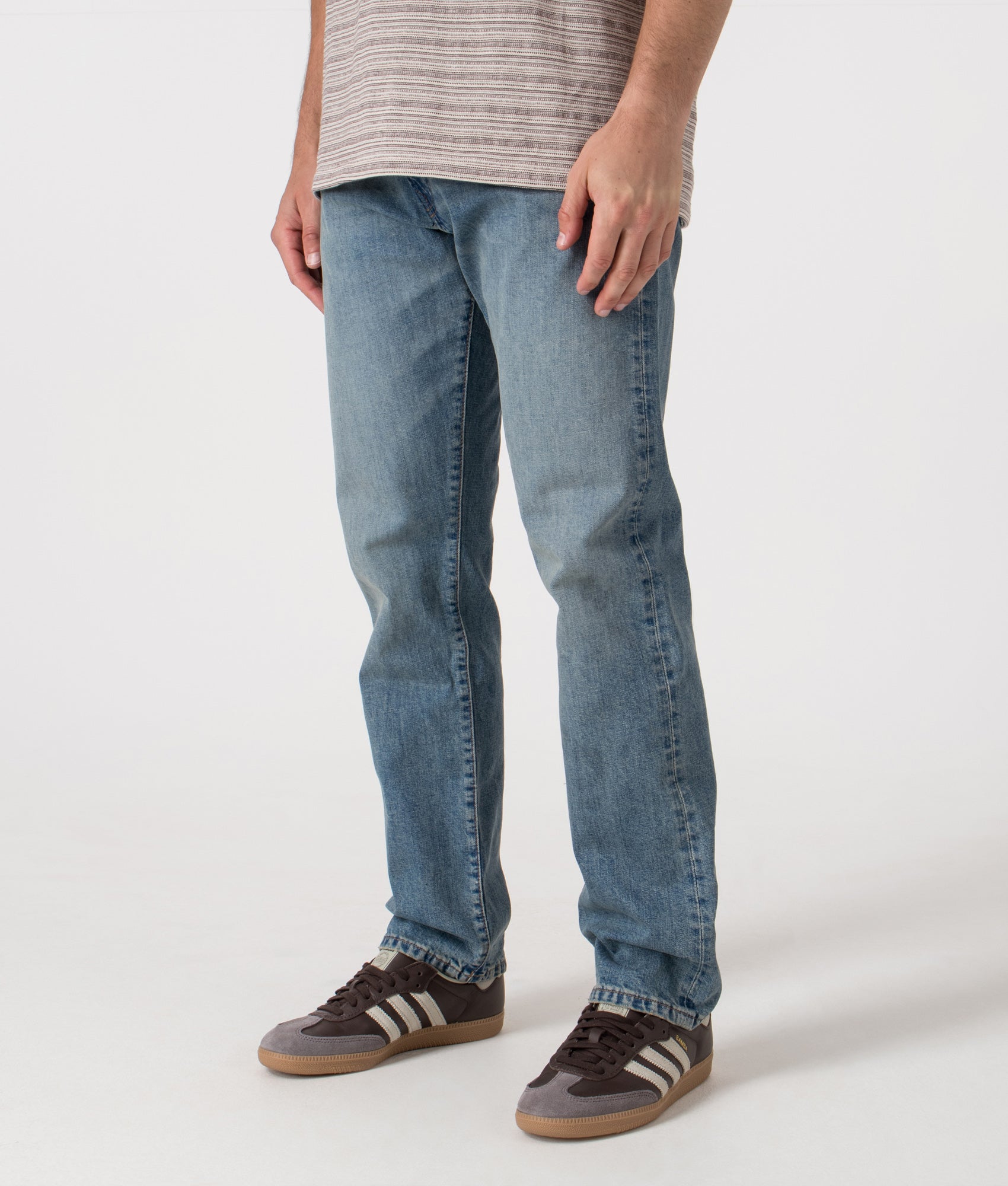 Polo Ralph Lauren Hampton Relaxed Straight Stretch Jeans in Dixon Stretch blue at EQVVS Menswear. Angled model front shot.