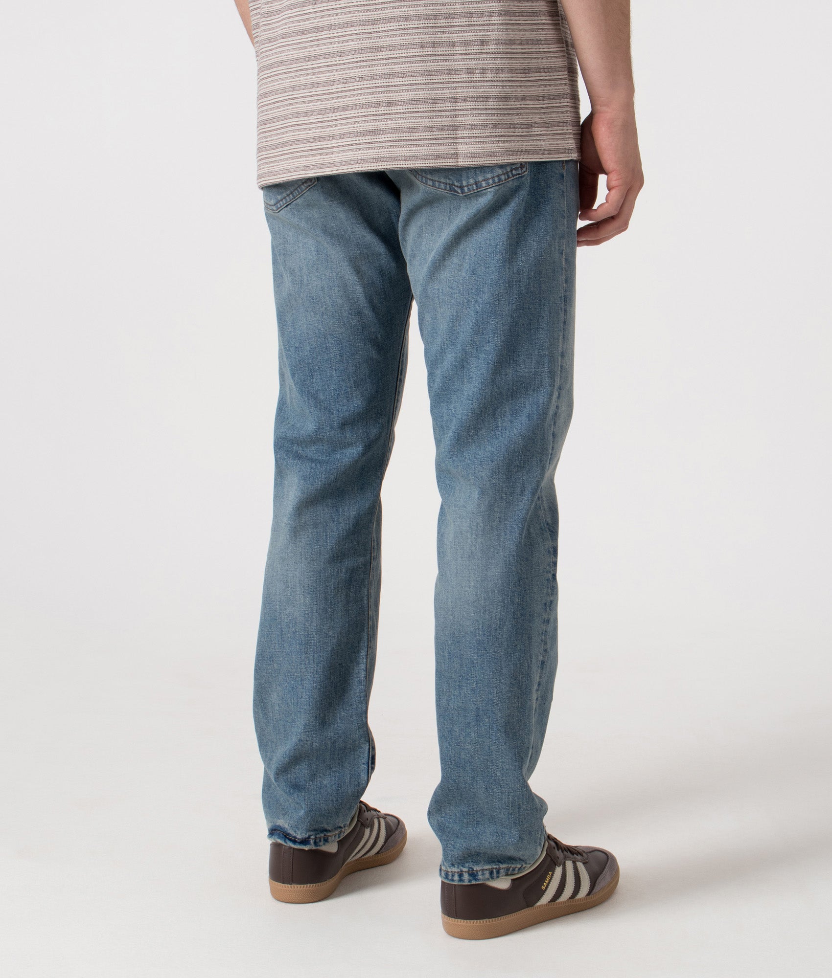 Polo Ralph Lauren Hampton Relaxed Straight Stretch Jeans in Dixon Stretch blue at EQVVS Menswear. Angled model back shot.
