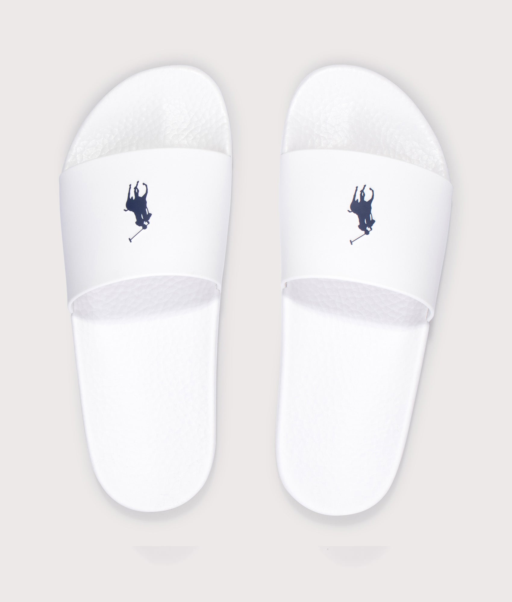 Polo Ralph Lauren Signature Pony Sliders in Ceramic White at EQVVS Menswear. Top shot.