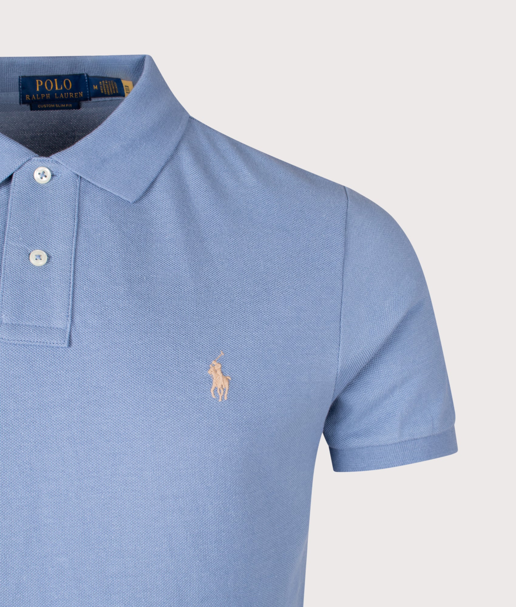 Custom Slim Fit Mesh Polo Shirt in Channel Blue | Polo Ralph Lauren | Shot at EQVVS | Front detail shot 
