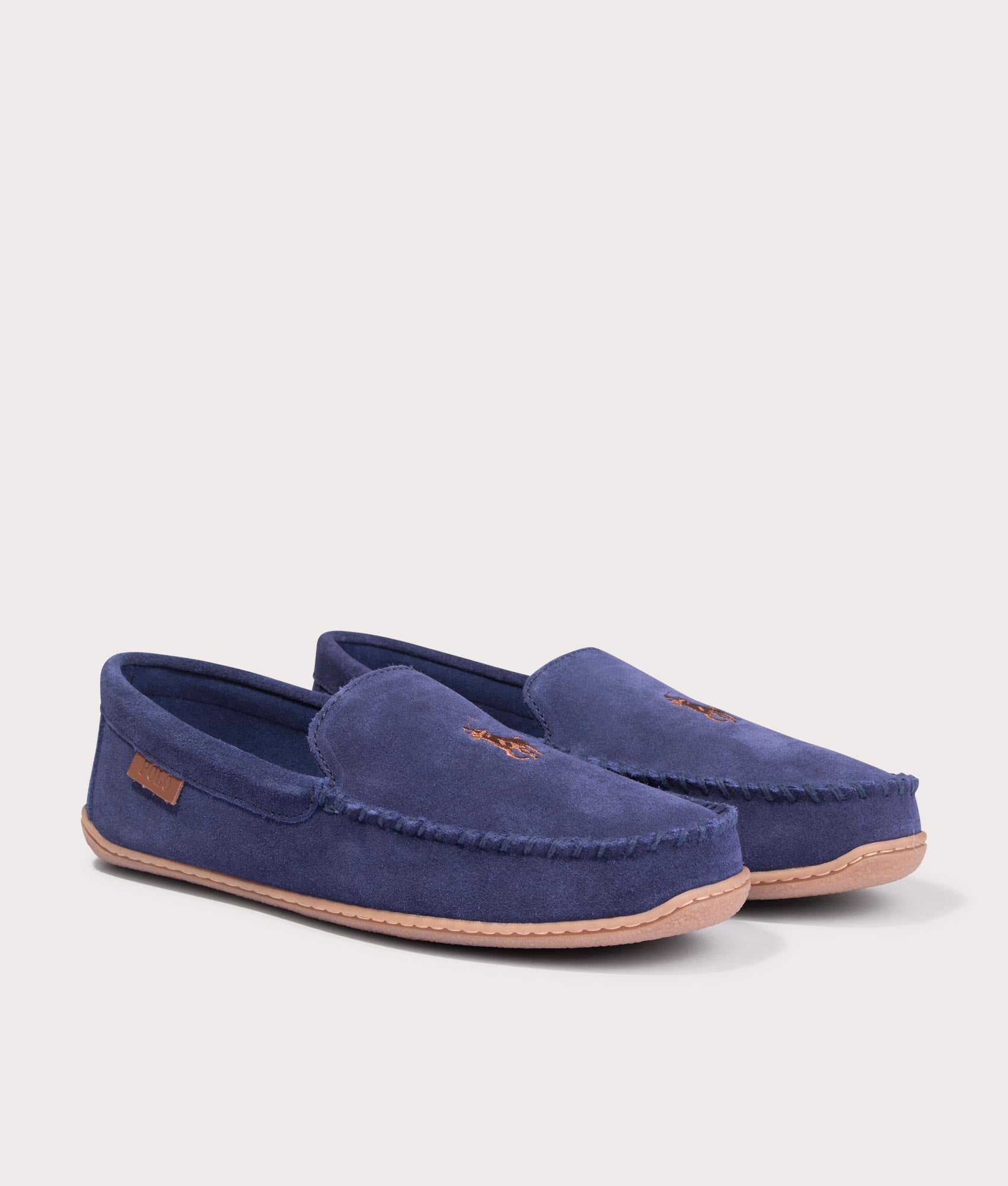 The Polo Ralph Lauren Brenan Suede Slippers in Navy at EQVVS Menswear. Front Angled Shot.