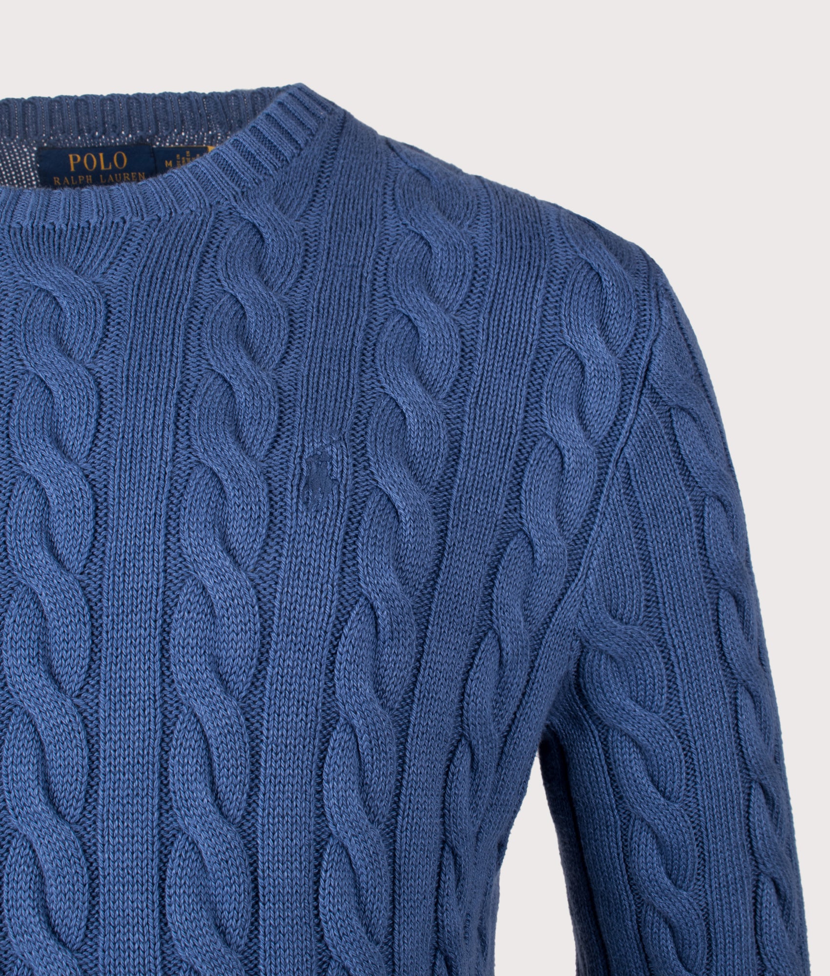 Polo Ralph Lauren Cable-Knit Garment-Dyed Cotton Jumper in Garment dyed Navy. Detail shot.