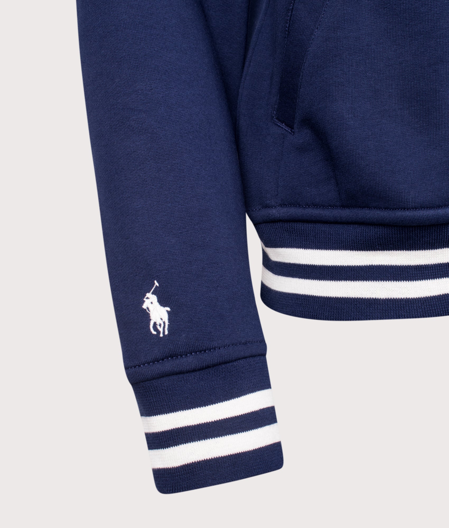 Logo Baseball Jacket by Polo Ralph Lauren in Newport Navy. Shot by EQVVS. Detail sleeve shot.
