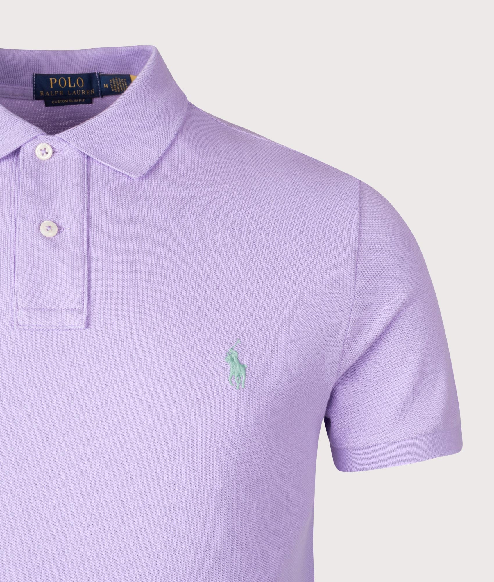 Custom Slim Fit Mesh Polo Shirt. Shot by EQVBVS. Front detail shot.