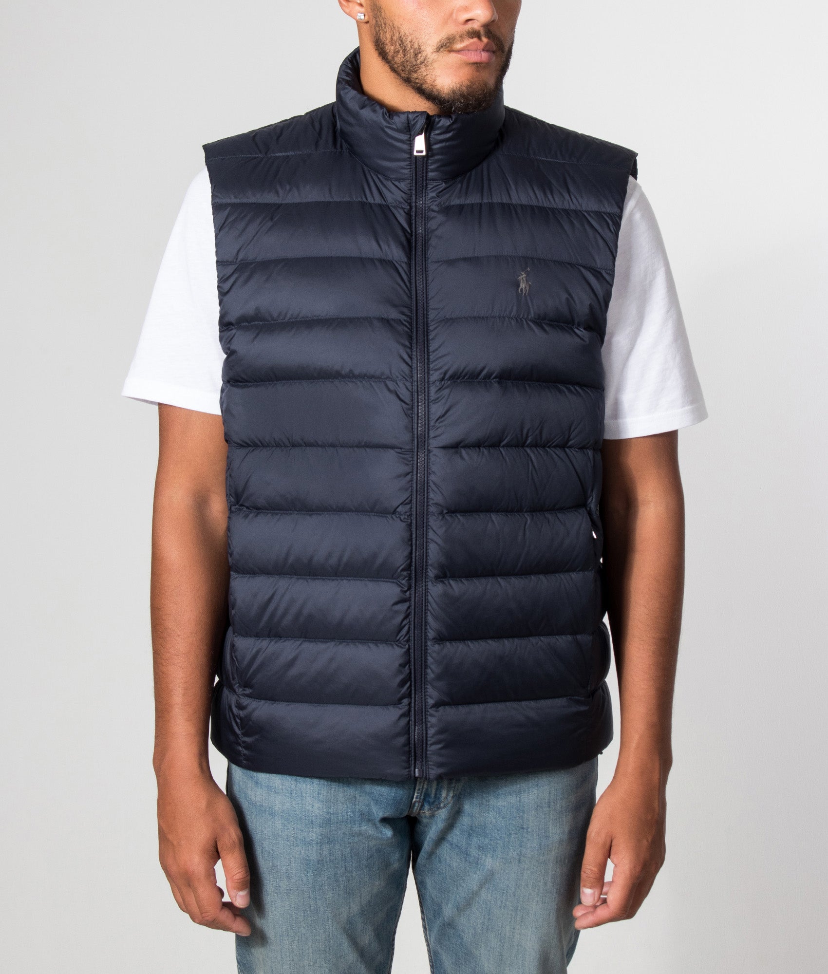 Polo Ralph Lauren Colden Packable Down Vest in Collection Navy at EQVVS Menswear. Model front shot.