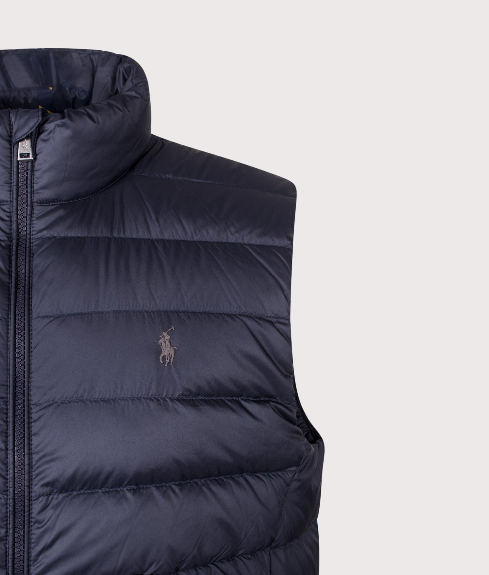 Polo Ralph Lauren Colden Packable Down Vest in Collection Navy at EQVVS Menswear. Detail shot.