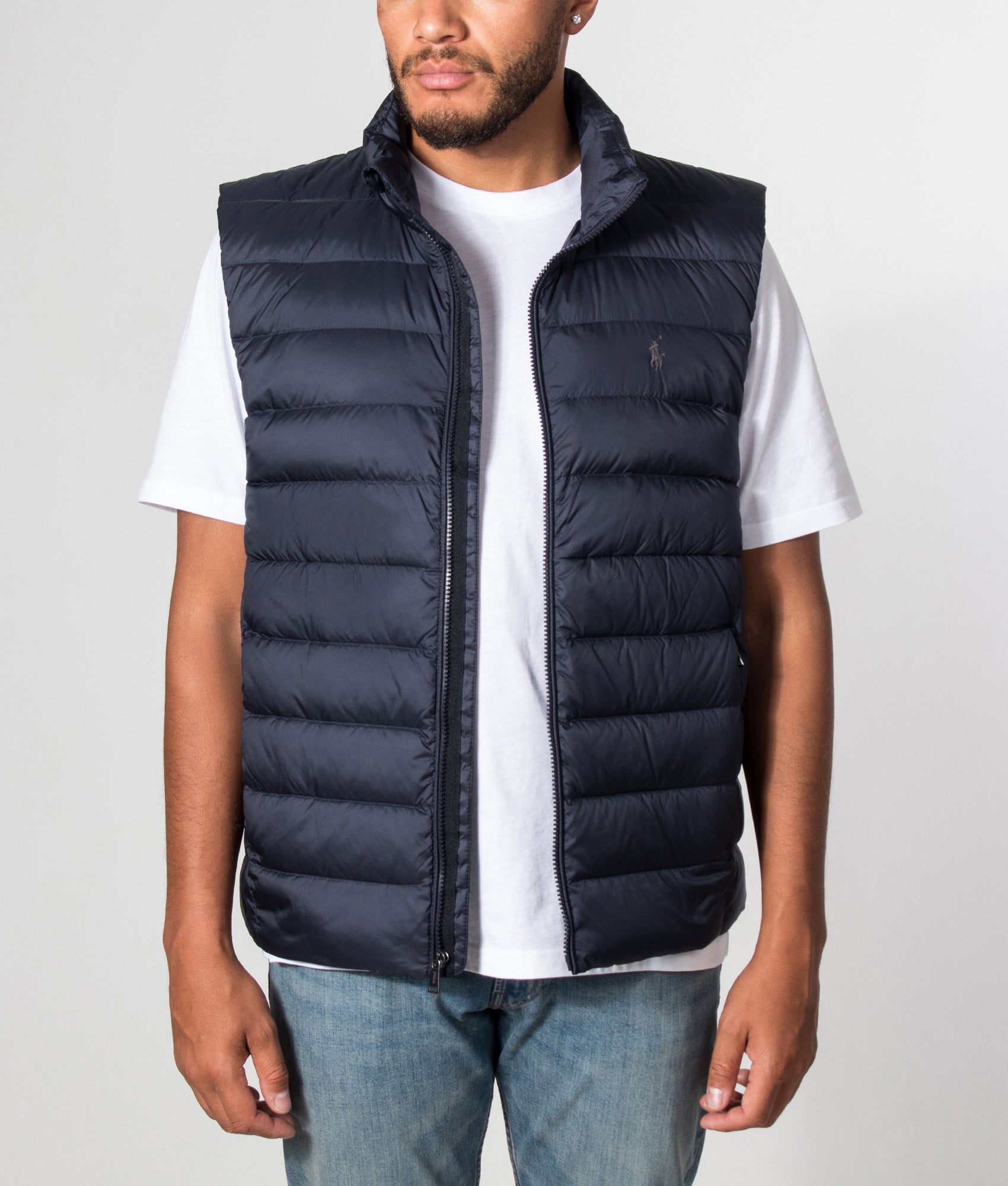 Polo Ralph Lauren Colden Packable Down Vest in Collection Navy at EQVVS Menswear. Model open shot.