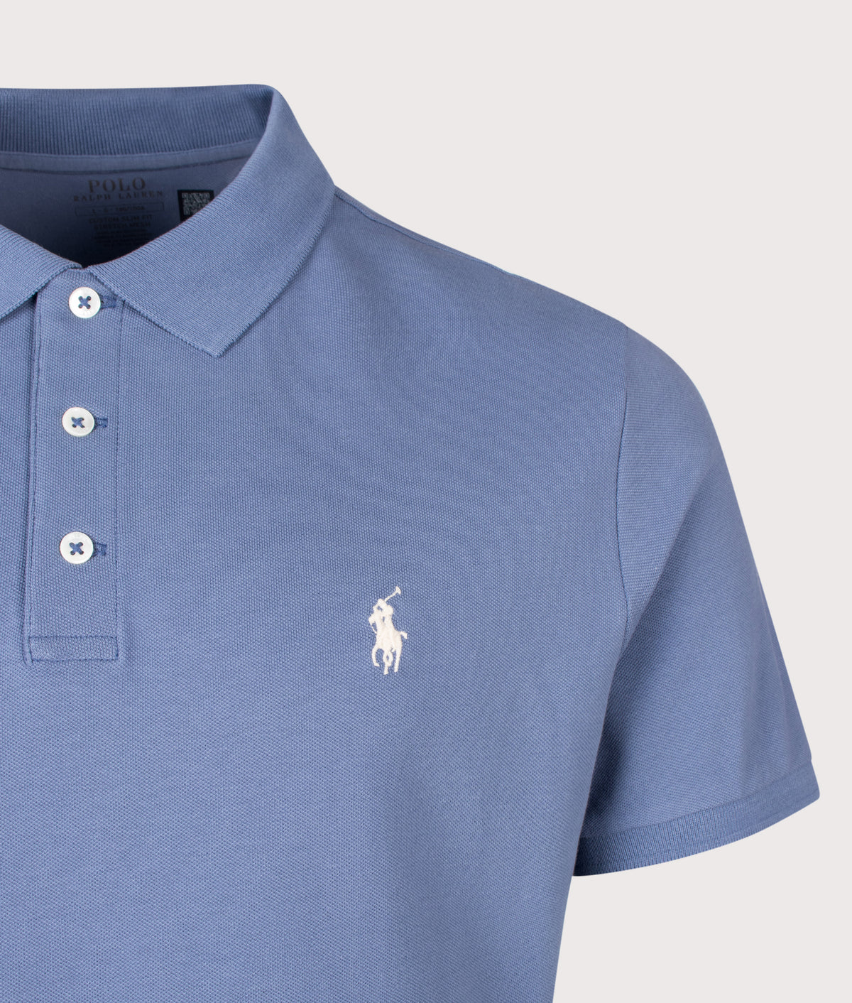 Polo Ralph Lauren Custom Slim Fit Stretch Mesh Polo Shirt in Capri Blue at EQVVS Menswear. Detail shot.