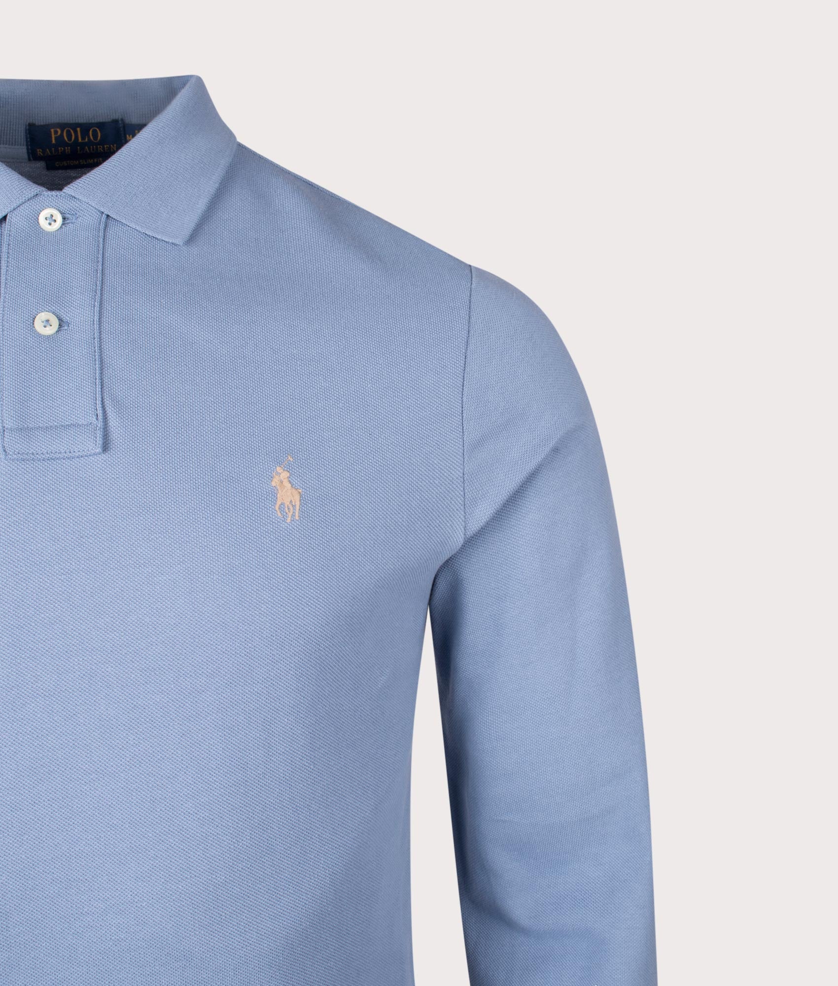 Custom Slim Fit Long Sleeve Polo Shirt in Channel Blue. 100% Cotton | Polo Ralph Lauren | Shot at EQVVS | Close up detail shot 