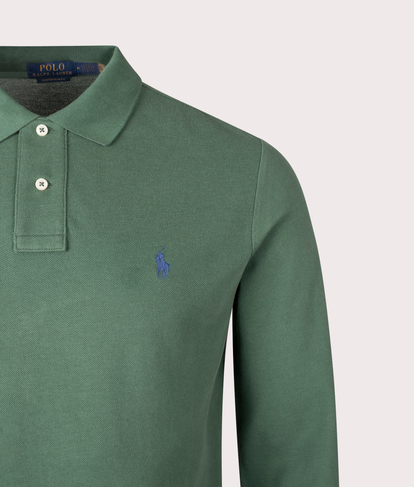 Custom Slim Fit Long Sleeve Polo Shirt in Wahed Forest . 100% Cotton | Polo Ralph Lauren | Shot at EQVVS | Front detail shot 