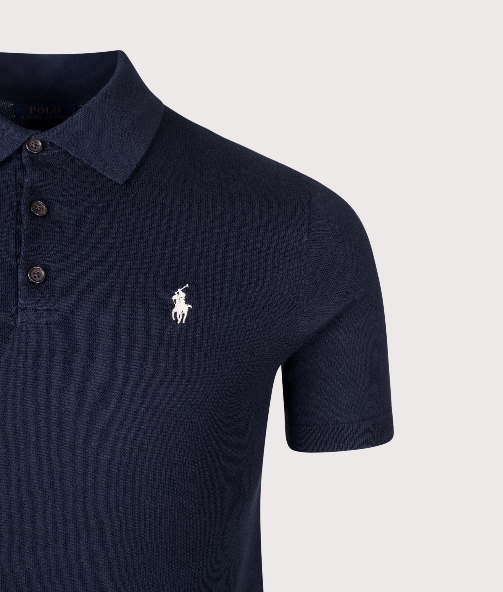 Polo Ralph Lauren Cotton Knitted Polo Shirt in Hunter Navy at EQVVS Menswear. Detail shot.