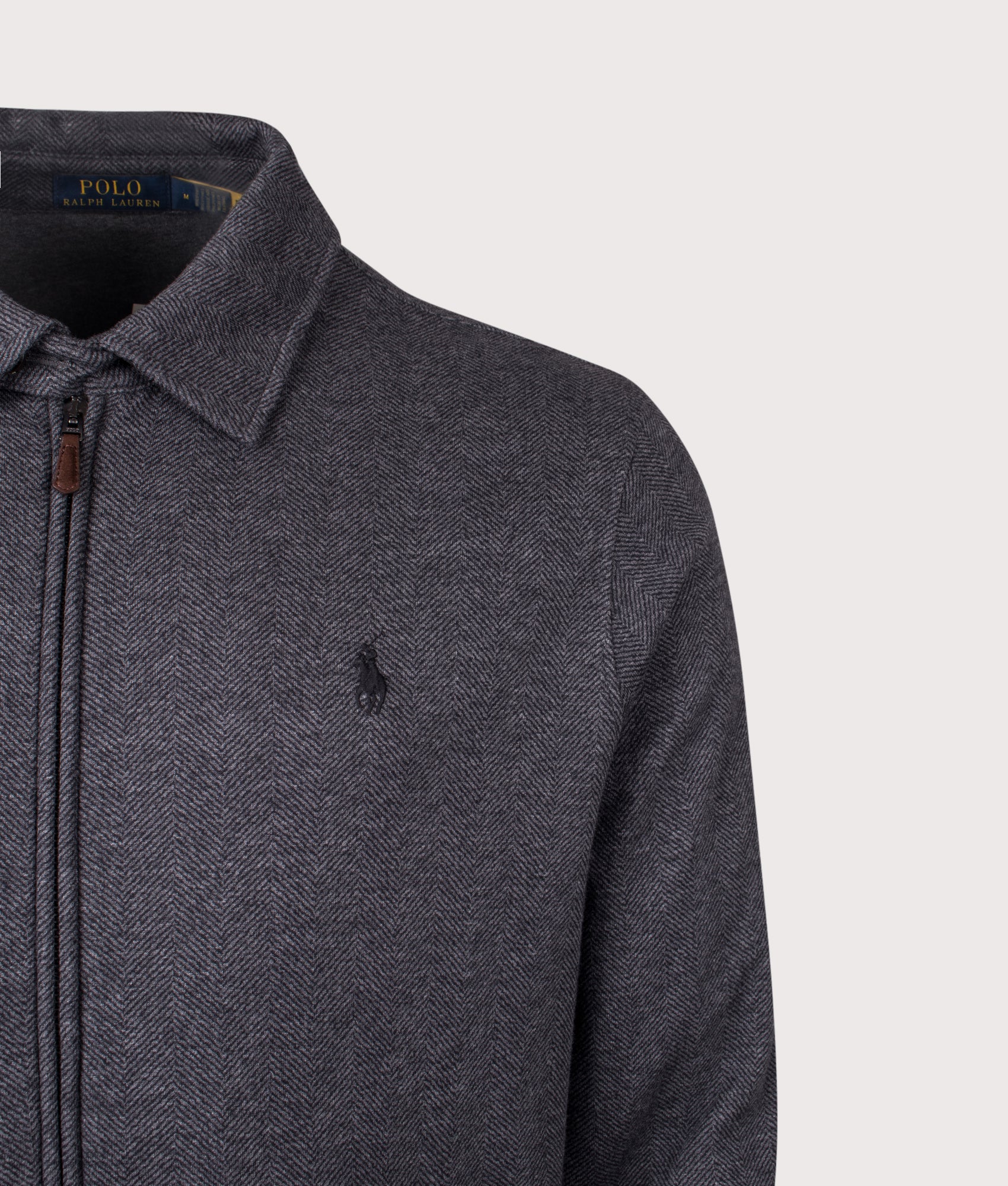 Polo Ralph Lauren Herringbone Jersey Bomber Jacket in Barclay Heather Herringbone at EQVVS Menswear. Detail shot.
