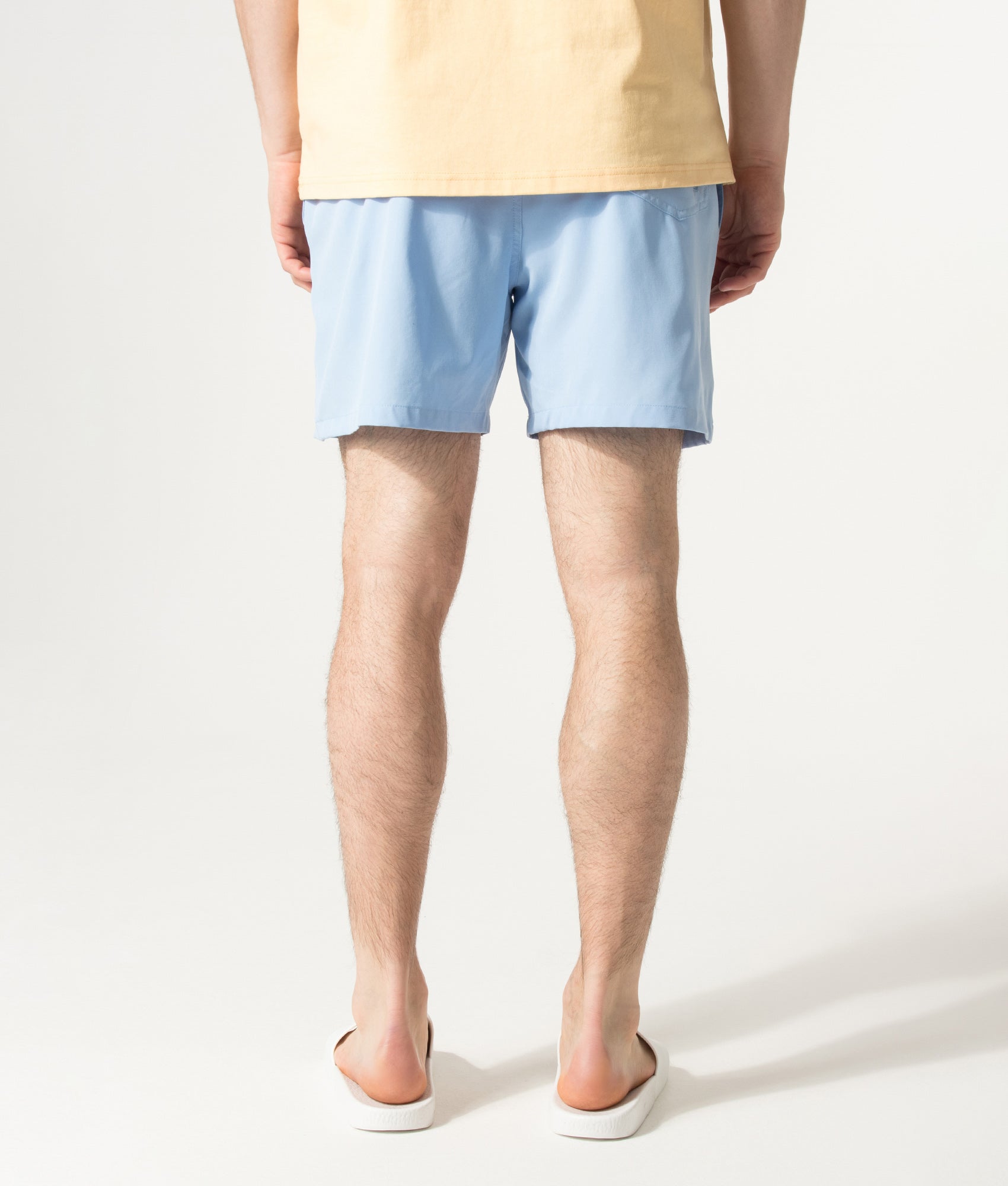 Polo Ralph Lauren Regular Fit Classic Swim Trunks in Austin Blue at EQVVS Menswear. Model back shot.