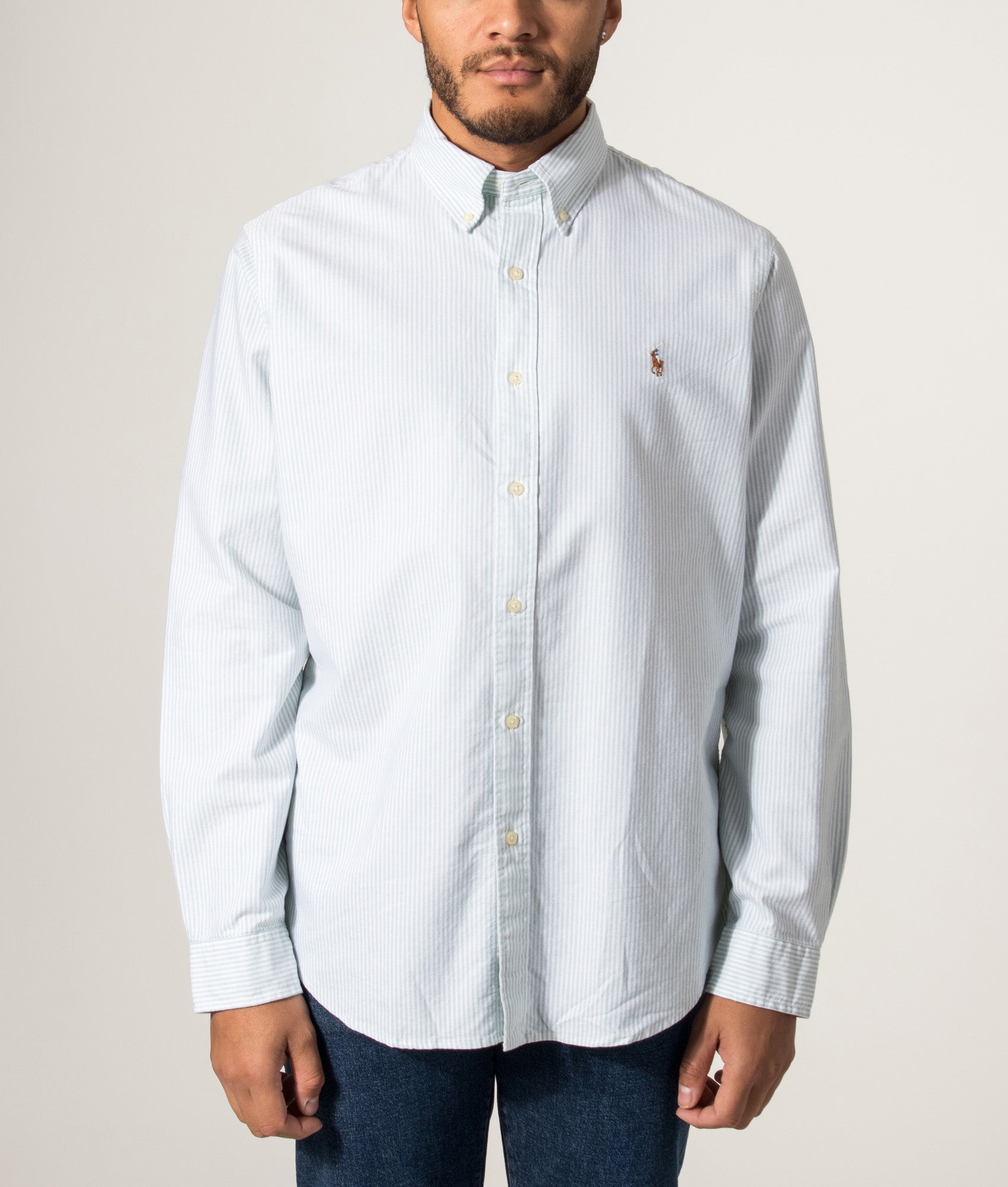 Polo Ralph Lauren Custom Fit Striped Oxford Shirt in Faded Mint and White stripe at EQVVS Menswear. Model front shot.