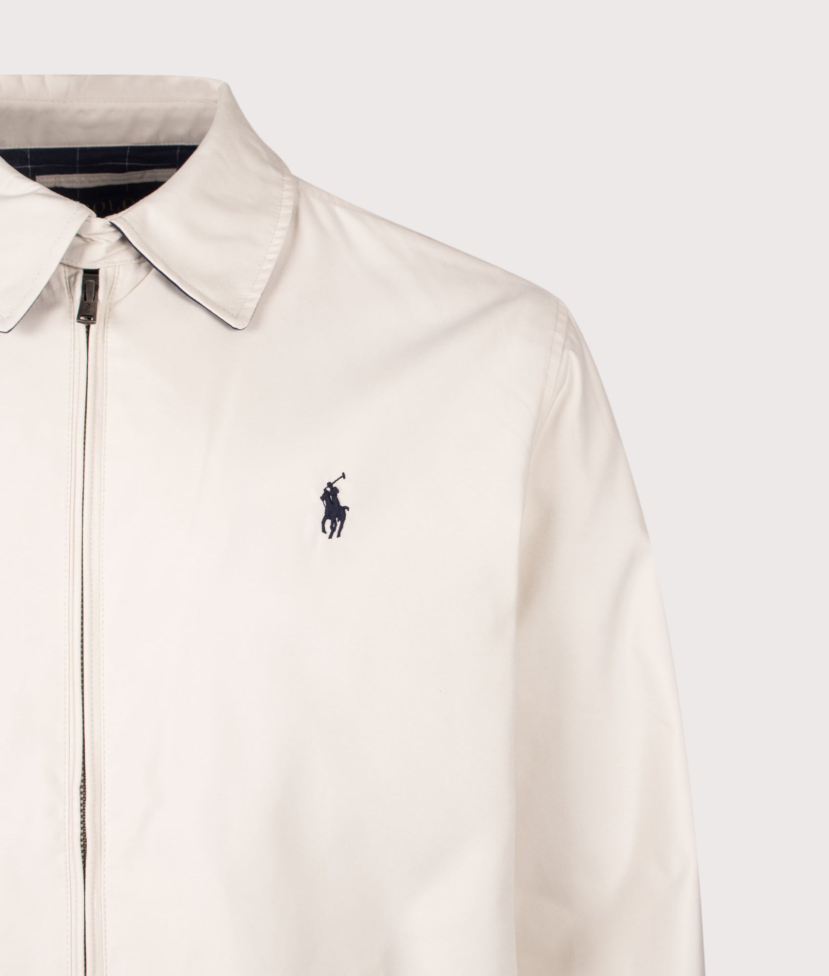 Polo Ralph Lauren Twill Bi-Swing Lined Windbreaker in New Stone at EQVVS Menswear. Detail shot.