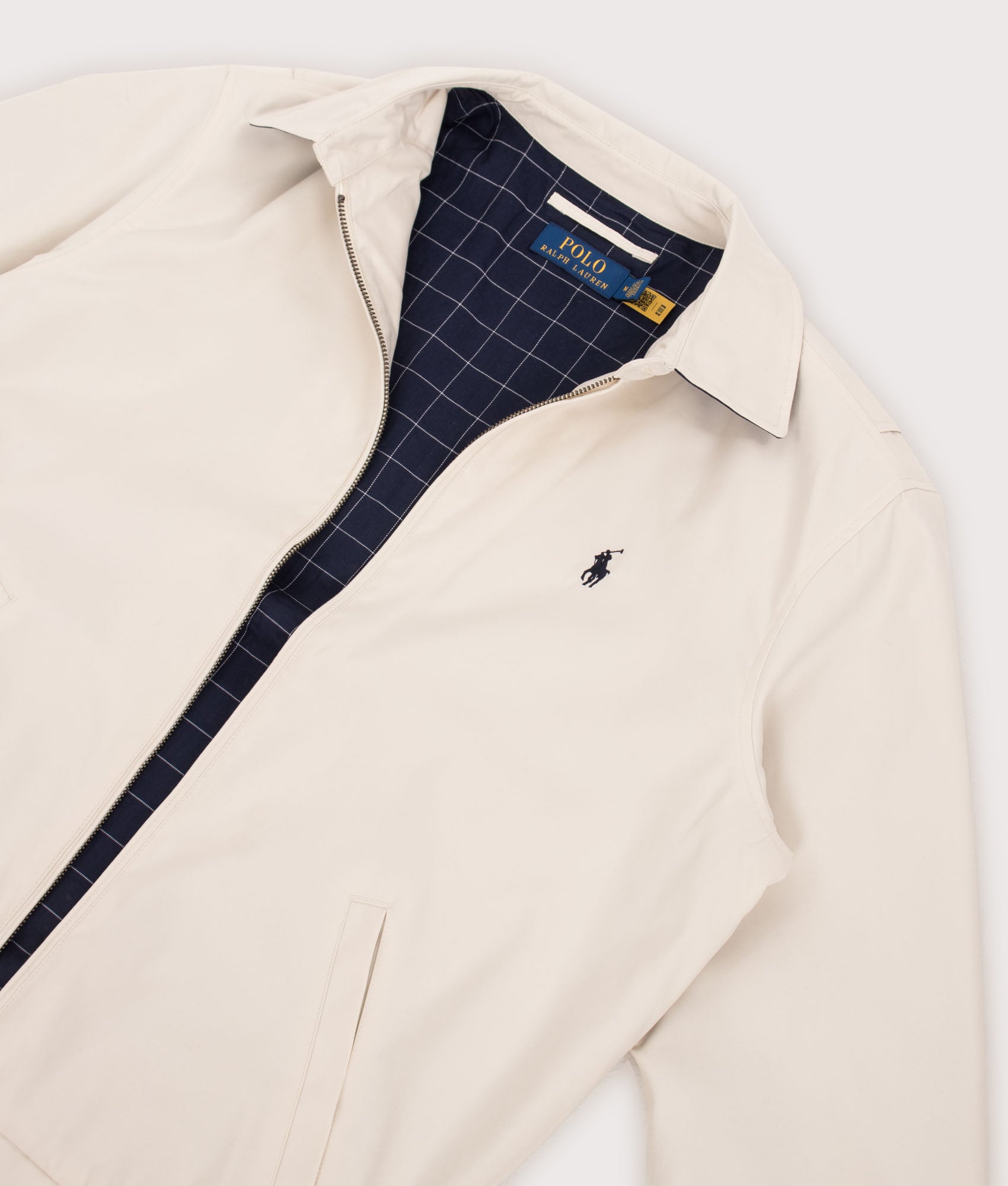 Polo Ralph Lauren Twill Bi-Swing Lined Windbreaker in New Stone at EQVVS Menswear. Second detail shot.