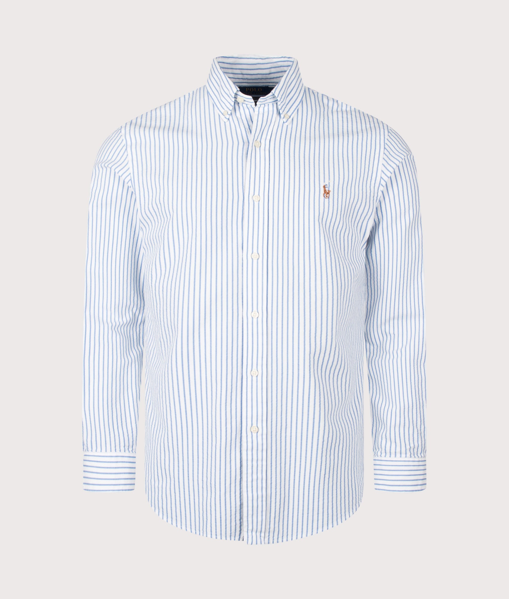 Polo Ralph Lauren Custom Fit Seersucker Oxford Shirt in White and BSR Blue stripe at EQVVS Menswear. Front shot.