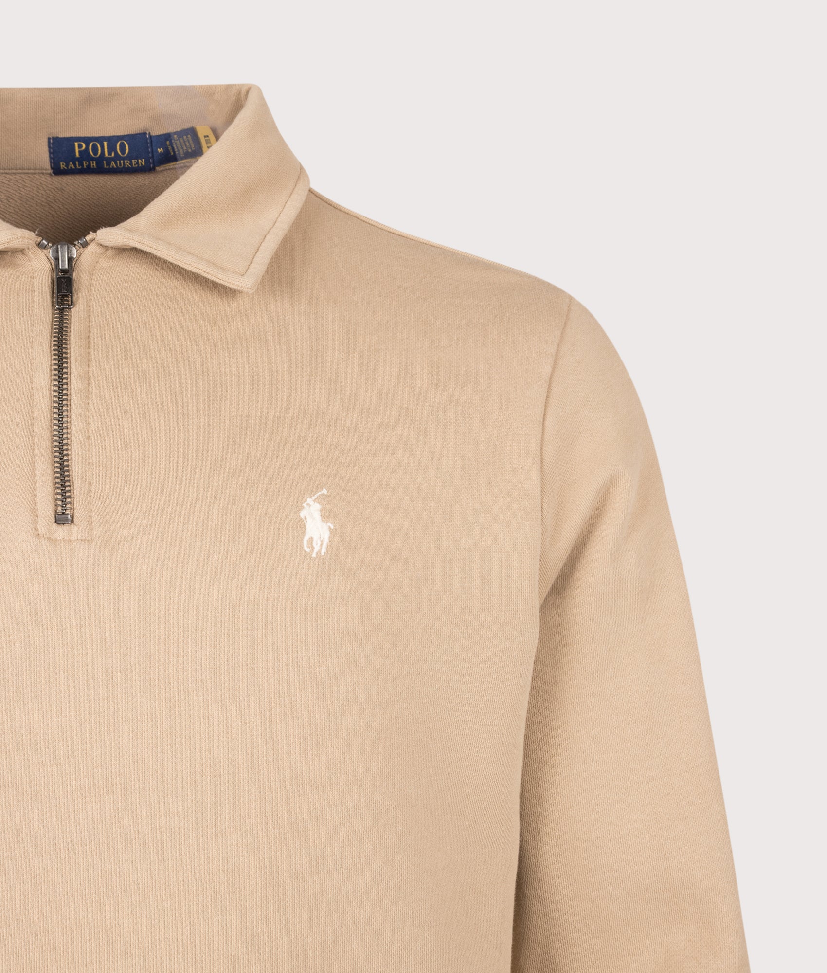 Polo Ralph Lauren Loopback Quarter Zip Sweatshirt in Vintage Khaki at EQVVS Menswear. Detail shot.