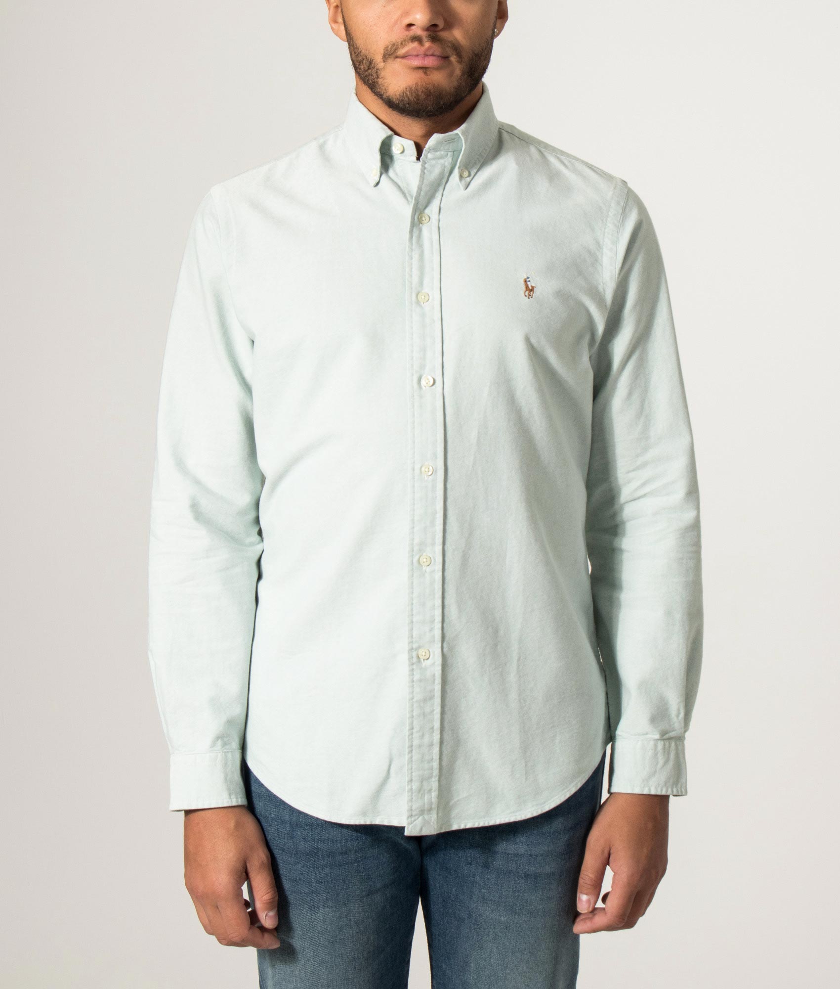 Polo Ralph Lauren look Custom Fit Iconic Oxford Shirt in Faded Mint at EQVVS Menswear. Model front shot.