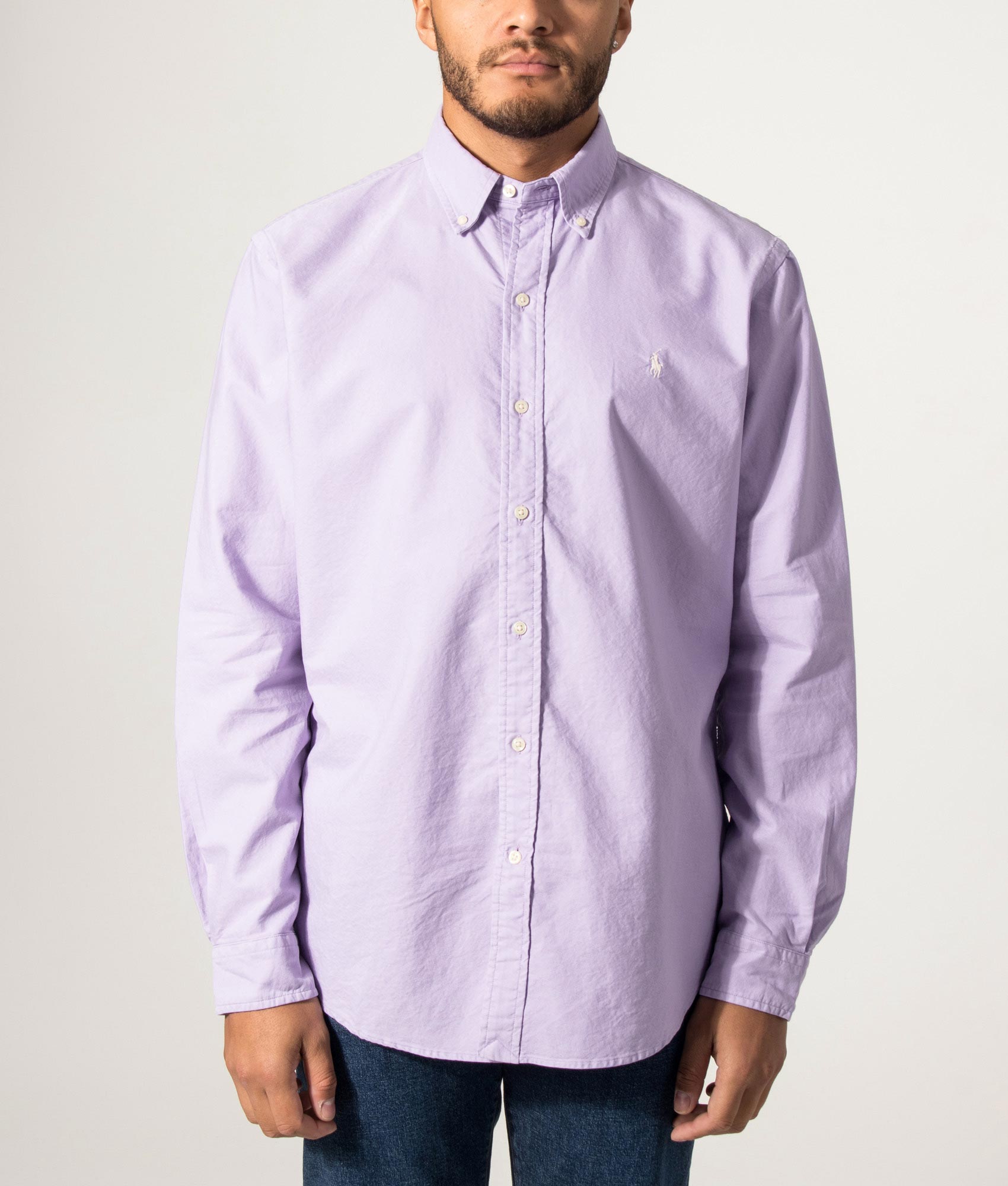 Polo Ralph Lauren Custom Fit Garment-Dyed Oxford Shirt in Powder Purple at EQVVS Menswear. Model front shot.
