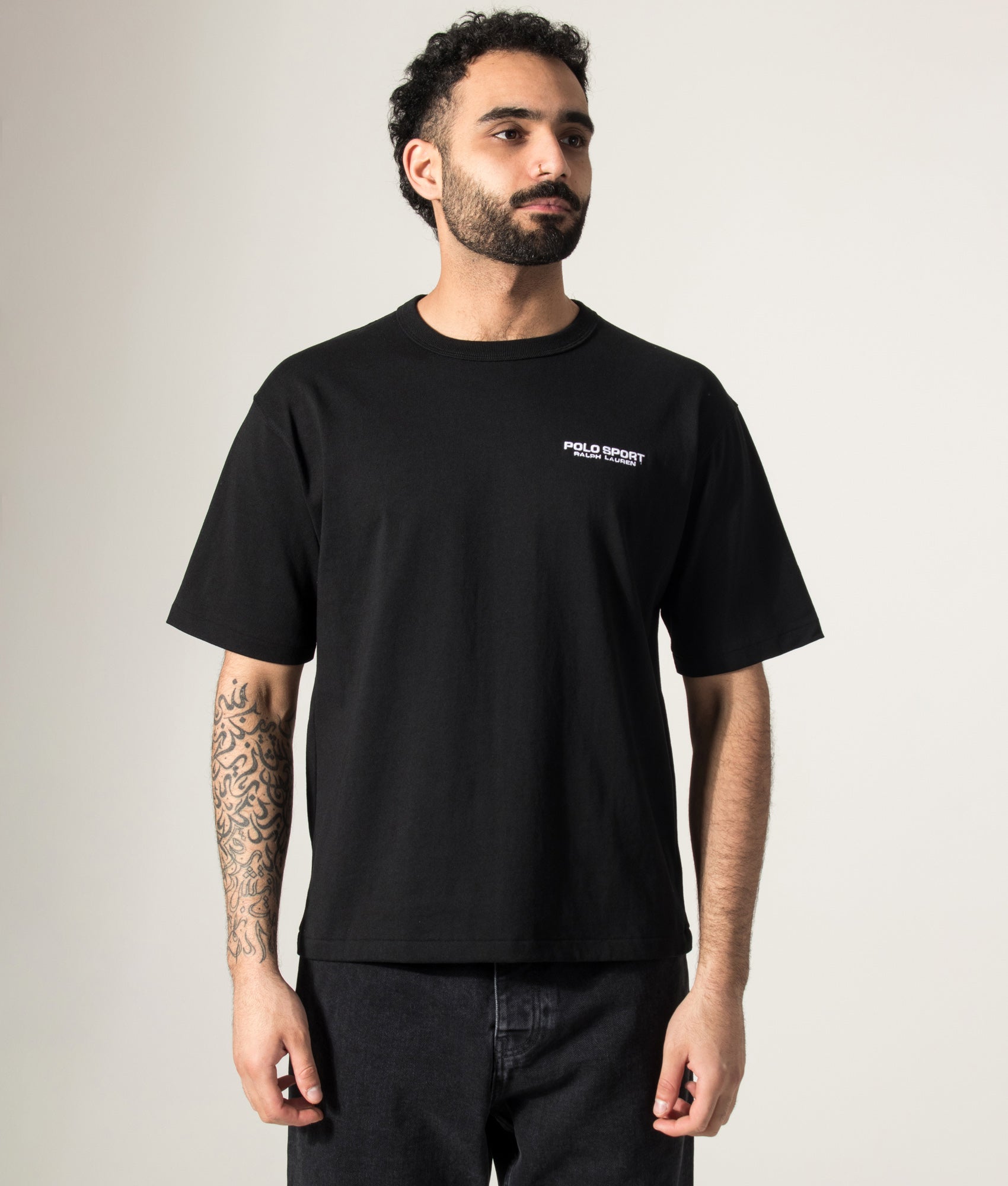 Polo Ralph Lauren Relaxed fit Polo Sport T-Shirt in Polo Black at EQVVS Menswear. Model front shot.