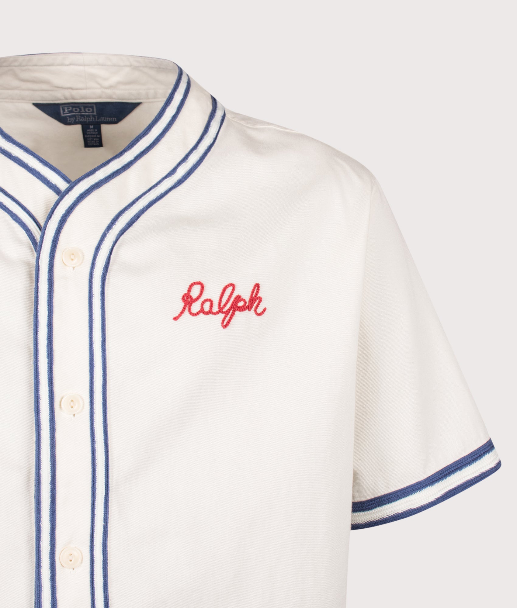 Polo Ralph Lauren Classic Fit Baseball Shirt in Warm White and Blue at EQVVS Menswear. Detail shot.