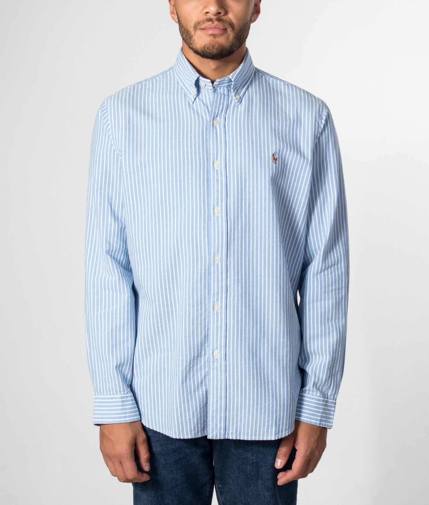 Polo Ralph Lauren Custom Fit Seersucker Oxford Shirt in BSR Blue and White stripe at EQVVS Menswear. Model front shot.