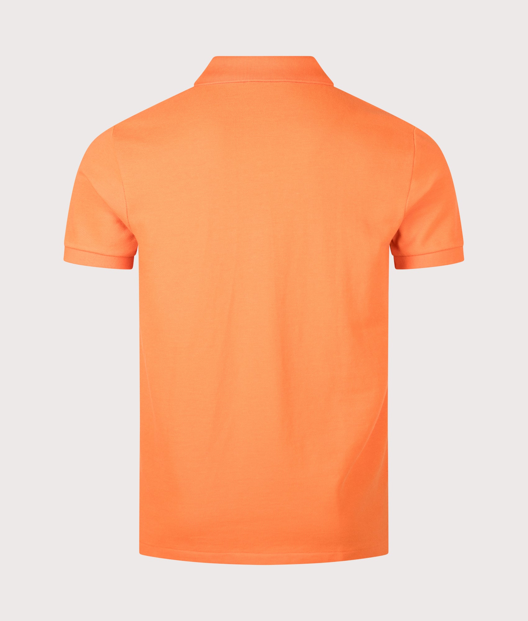 Custom Slim Fit Mesh Polo Shirt in Kona Orange by Polo Ralph Lauren. Shot by EQVVS. Back shot.