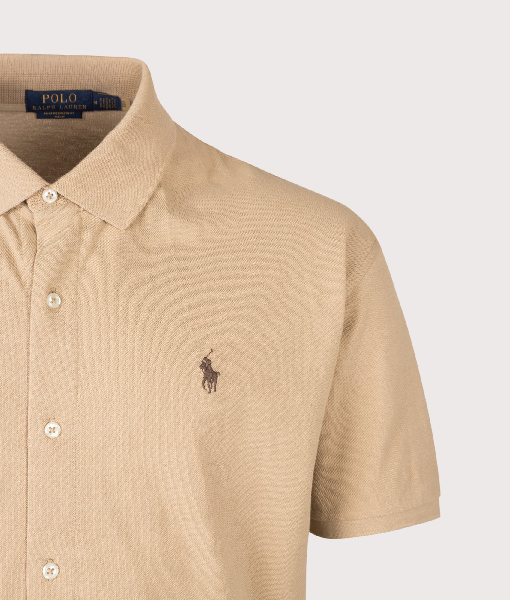 Polo Ralph Lauren Polo shirt Relaxed Fit Cotton Mesh Shirt in Vintage Khaki at EQVVS Menswear. Detail shot.