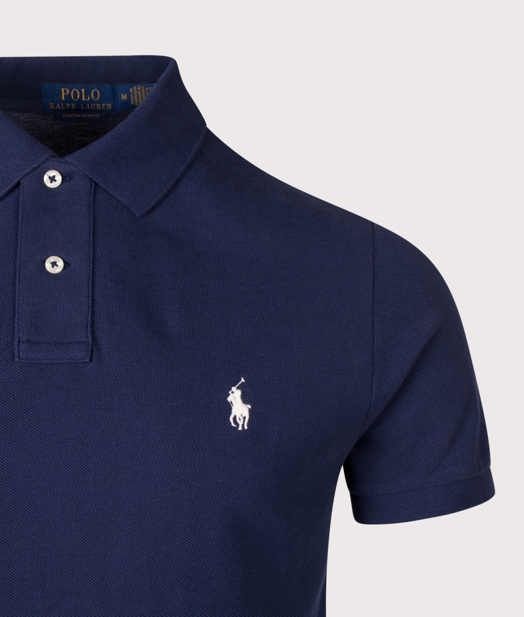 Polo Ralph Lauren Custom Slim Fit Mesh Polo Shirt in Newport Navy at EQVVS Menswear. Detail shot.
