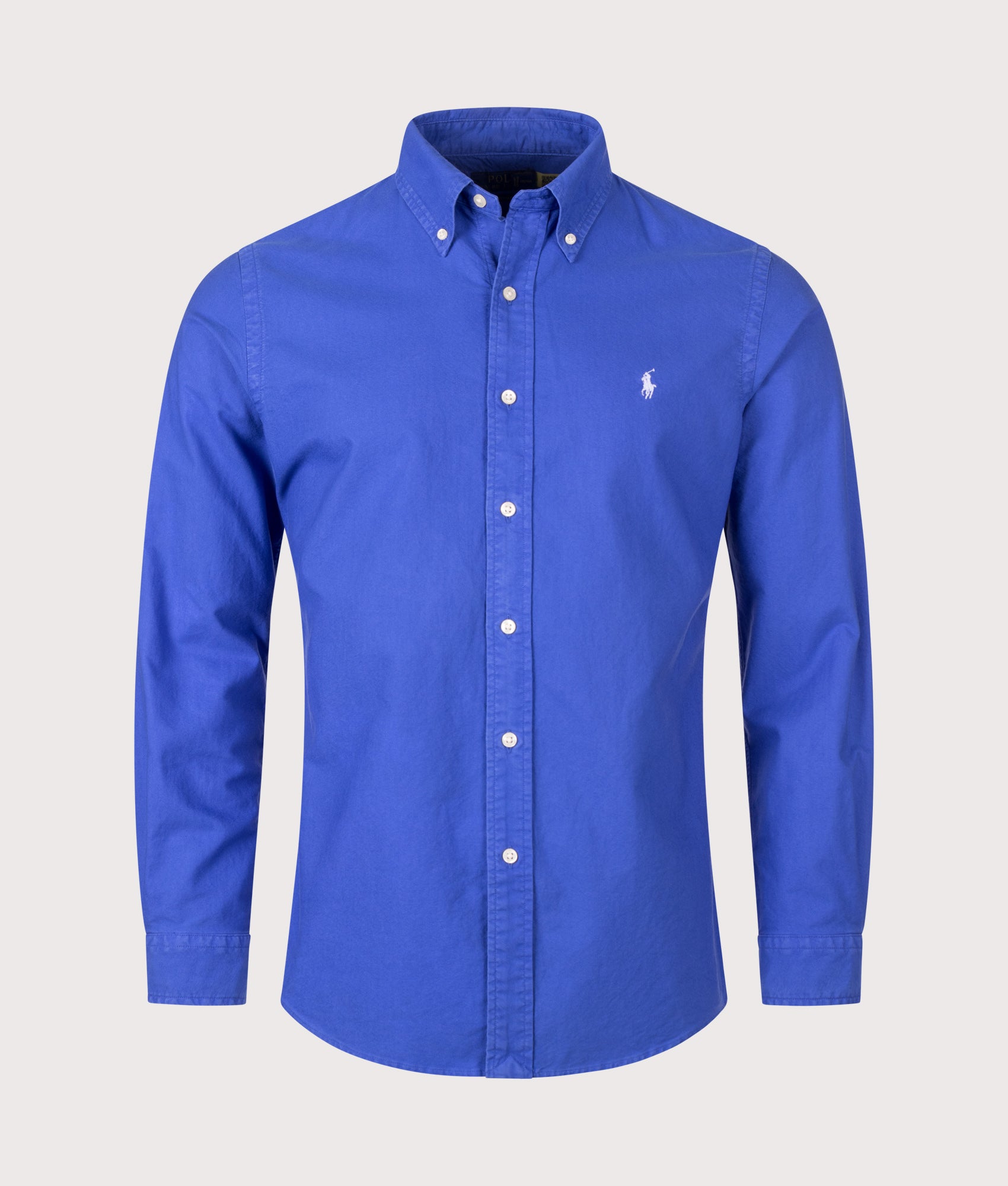 Polo Ralph Lauren Custom Fit Garment-Dyed Oxford Shirt in New Iris Blue at EQVVS Menswear. Front shot.