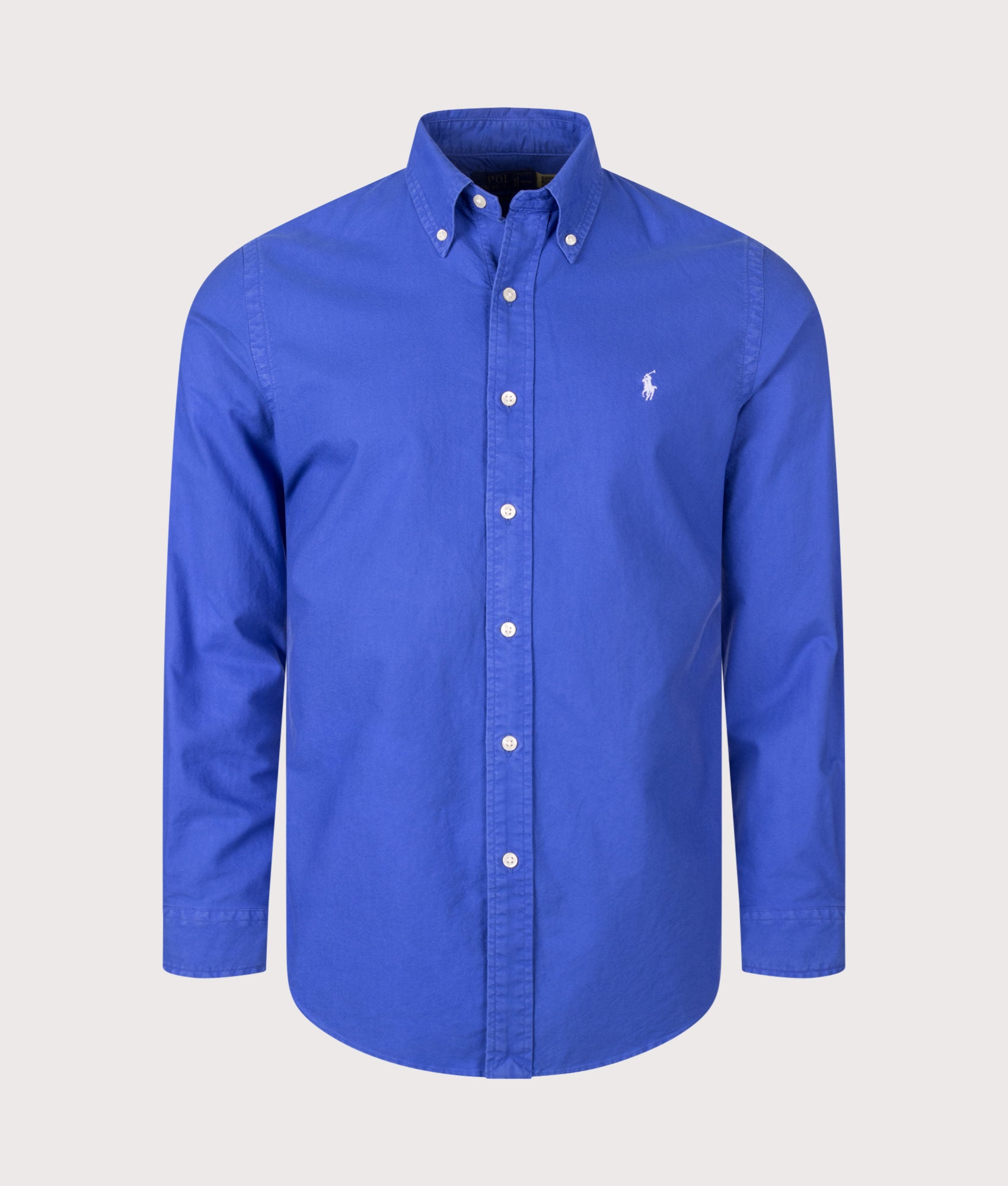 Polo Ralph Lauren Custom Fit Garment-Dyed Oxford Shirt in New Iris Blue at EQVVS Menswear. Front shot.