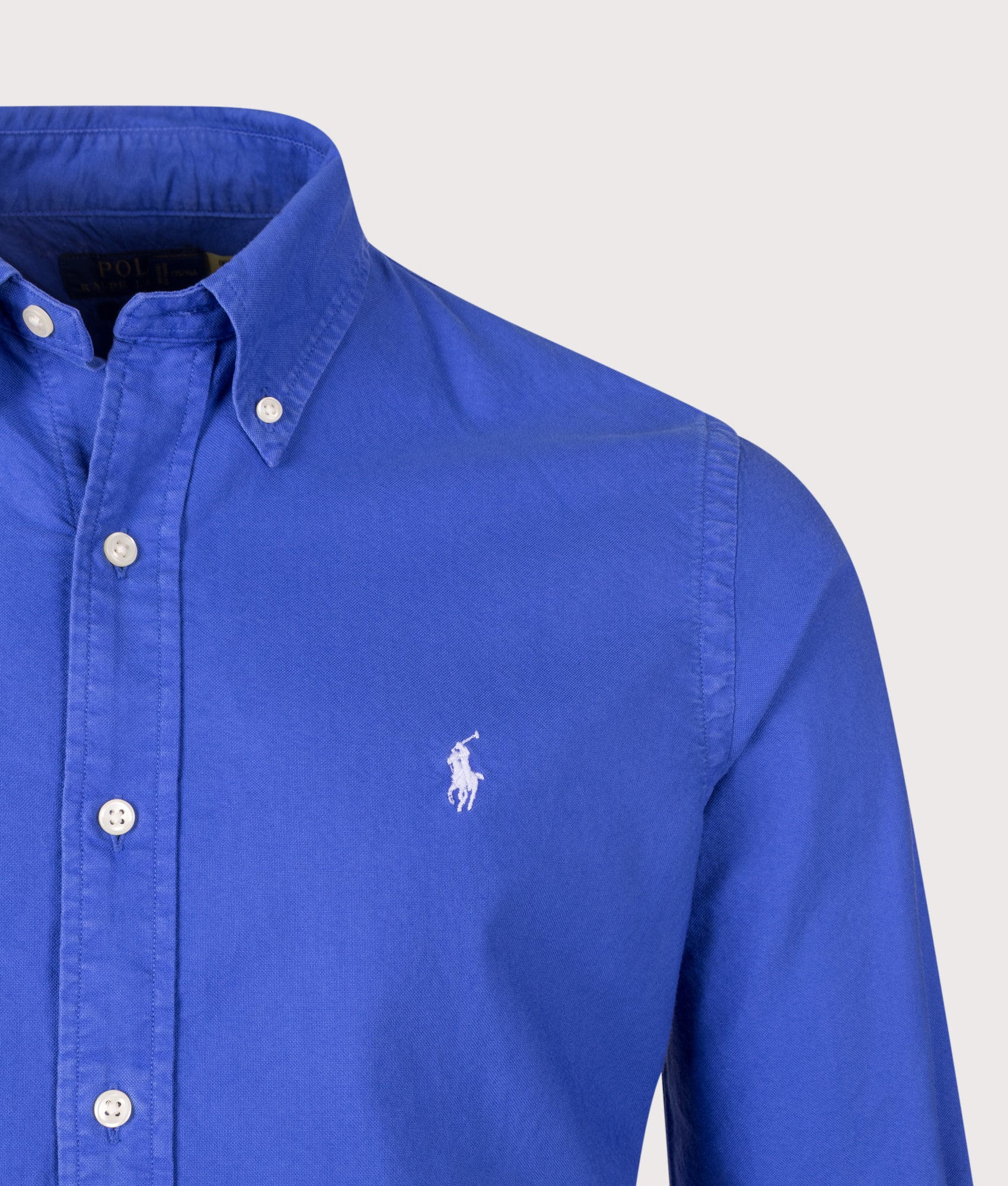 Polo Ralph Lauren Custom Fit Garment-Dyed Oxford Shirt in New Iris Blue at EQVVS Menswear. Detail shot.