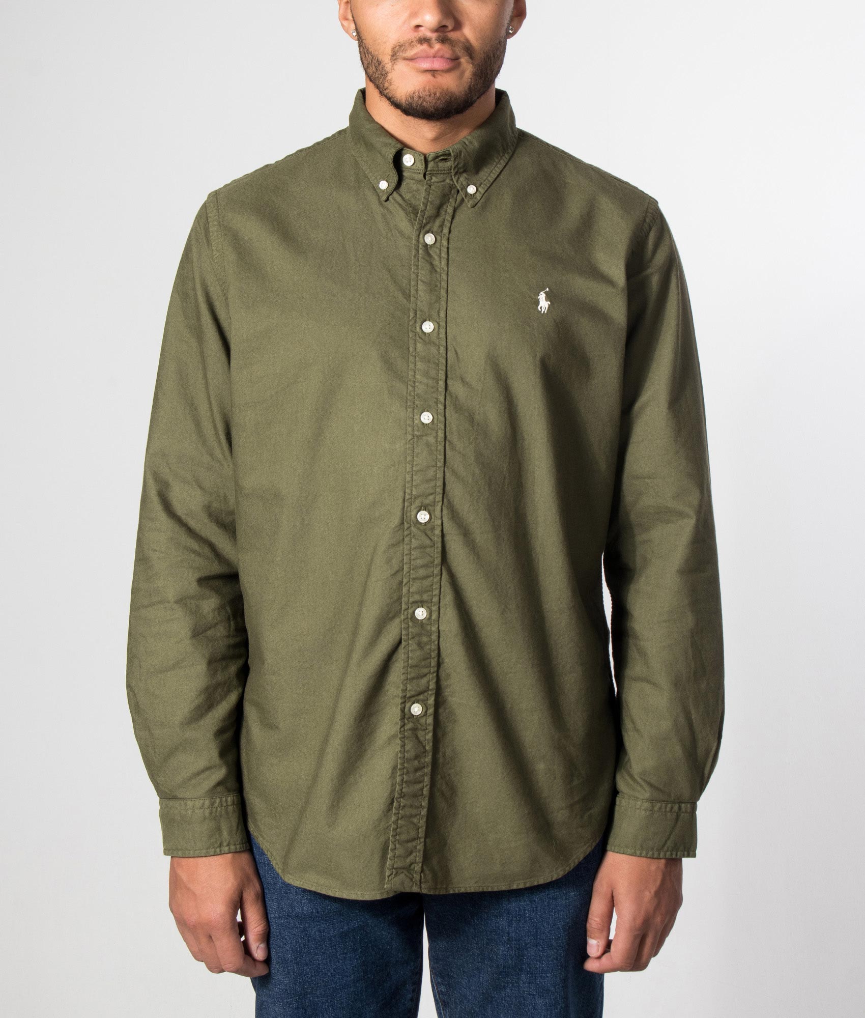 Polo Ralph Lauren Custom Fit Garment-Dyed Oxford Shirt in New Olive and Cream Polo Player at EQVVS Menswear.  Model front shot.