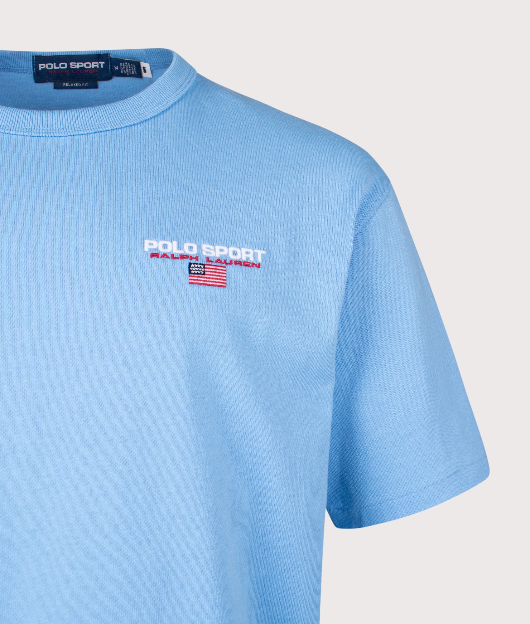 Polo Ralph Lauren Relaxed Fit Polo Sport Flag Logo T-Shirt in Chatham Blue at EQVVS Menswear. Detail shot.