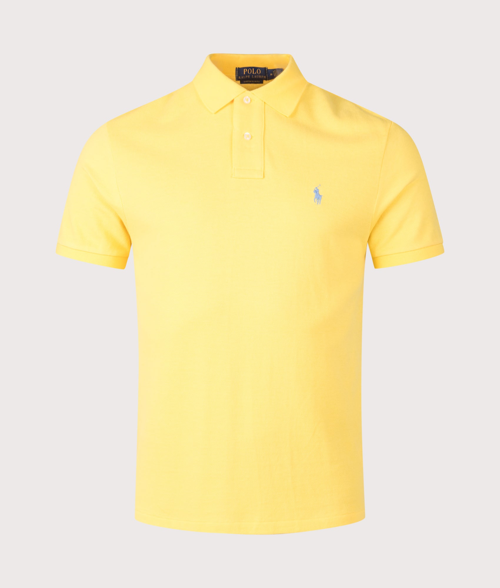 Polo Ralph Lauren Custom Slim Fit Mesh Polo Shirt in Sunfish Yellow at EQVVS Menswear. Front shot.