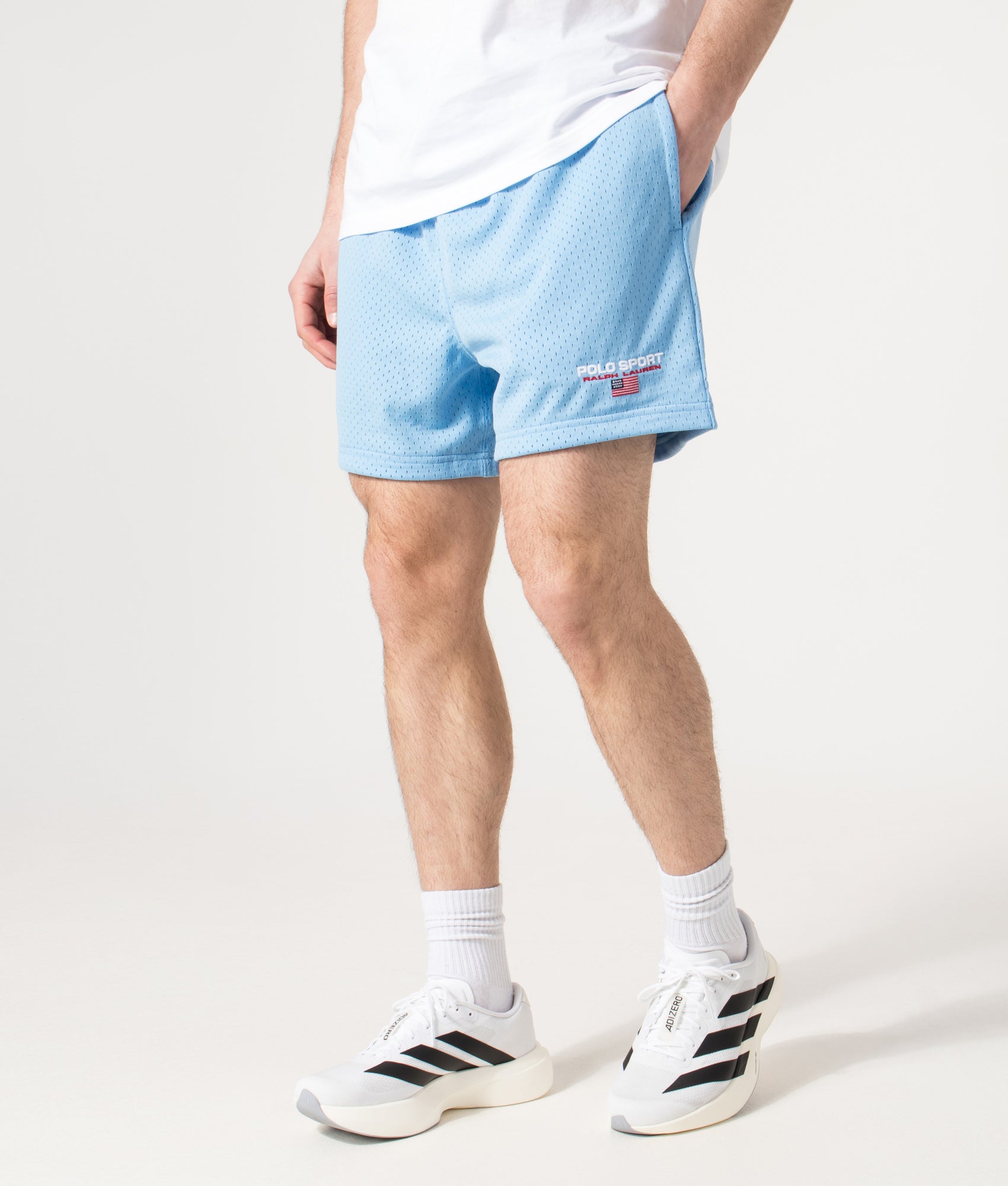 Polo Ralph Lauren Performance Mesh Sweat Shorts in Chatham Blue at EQVVS Menswear. Angled model front shot.