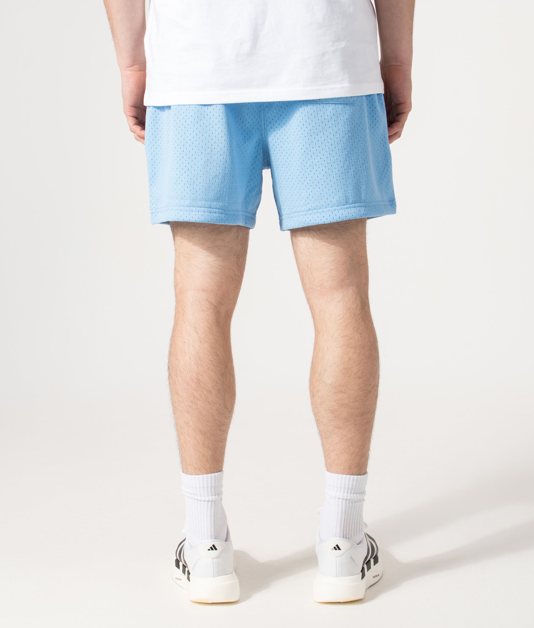 Polo Ralph Lauren Performance Mesh Sweat Shorts in Chatham Blue at EQVVS Menswear. Model back shot.