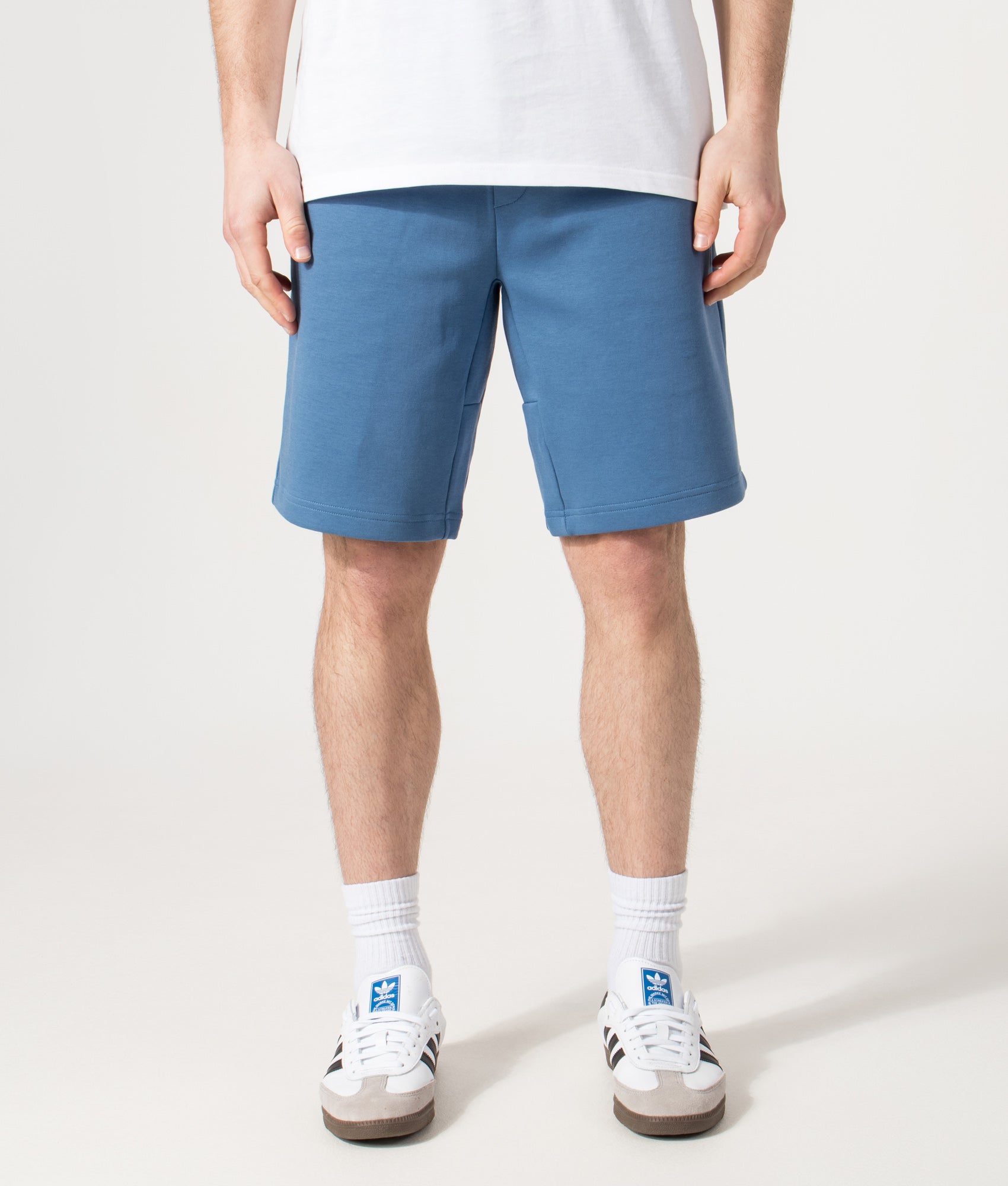 Polo Ralph Lauren Regular Fit Double Knit Athletic Sweat Shorts in Delta Blue at EQVVS Menswear. Model front shot.
