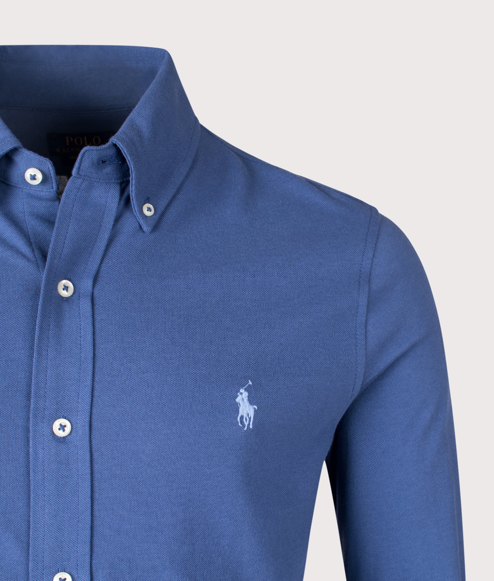 Polo Ralph Lauren Relaxed Fit Featherweight Mesh Shirt in Old Royal at EQVVS Menswear. Detail shot.