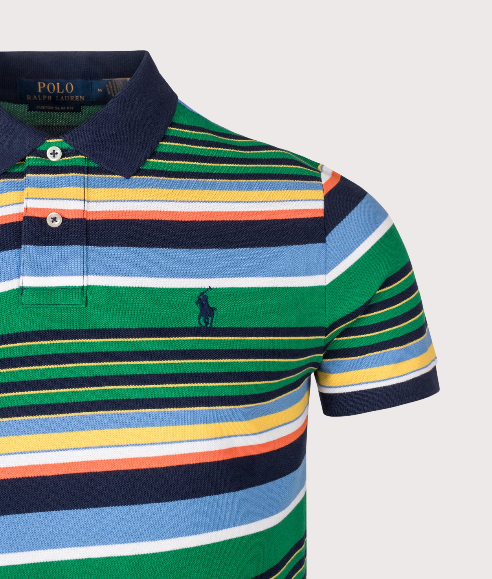 Custom Slim Fit Striped Mesh Polo Shirt in Billiard Stripe by Polo Ralph Lauren. Shot by EQVVS. Detail shot. 