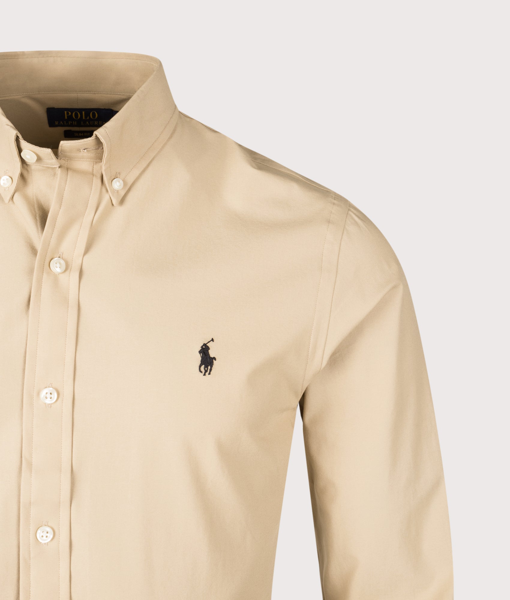 Slim Fit Stretch Poplin Shirt in Coastal Beige. | Polo Ralph Lauren | Shot at EQVVS | Front detail shot