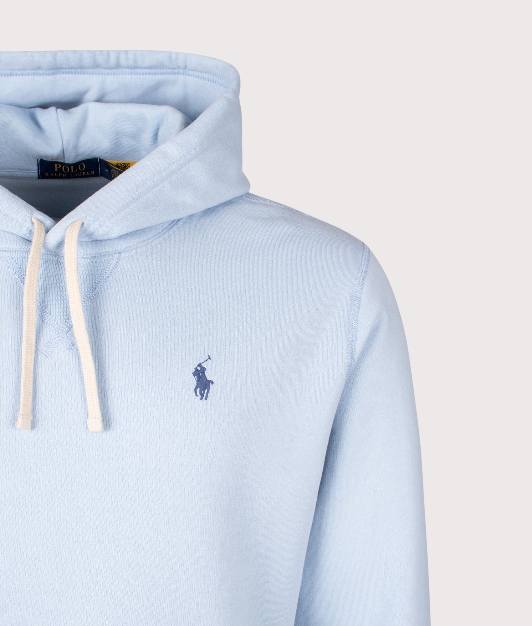 Polo Ralph Lauren Relaxed Fit RL Fleece Hoodie in Southport Blue at EQVVS Menswear. Detail shot.