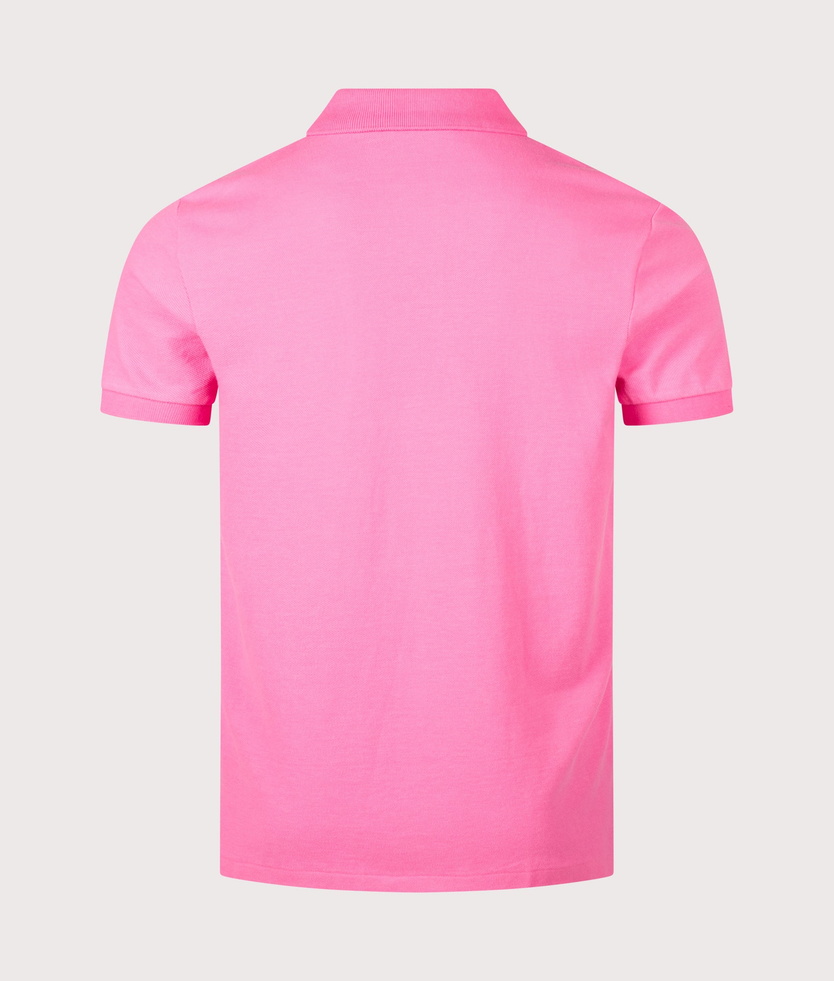 Custom Slim Fit Mesh Polo Shirt in Baja Pink by Polo Ralph Lauren. Shot by EQVVS. Back shot.