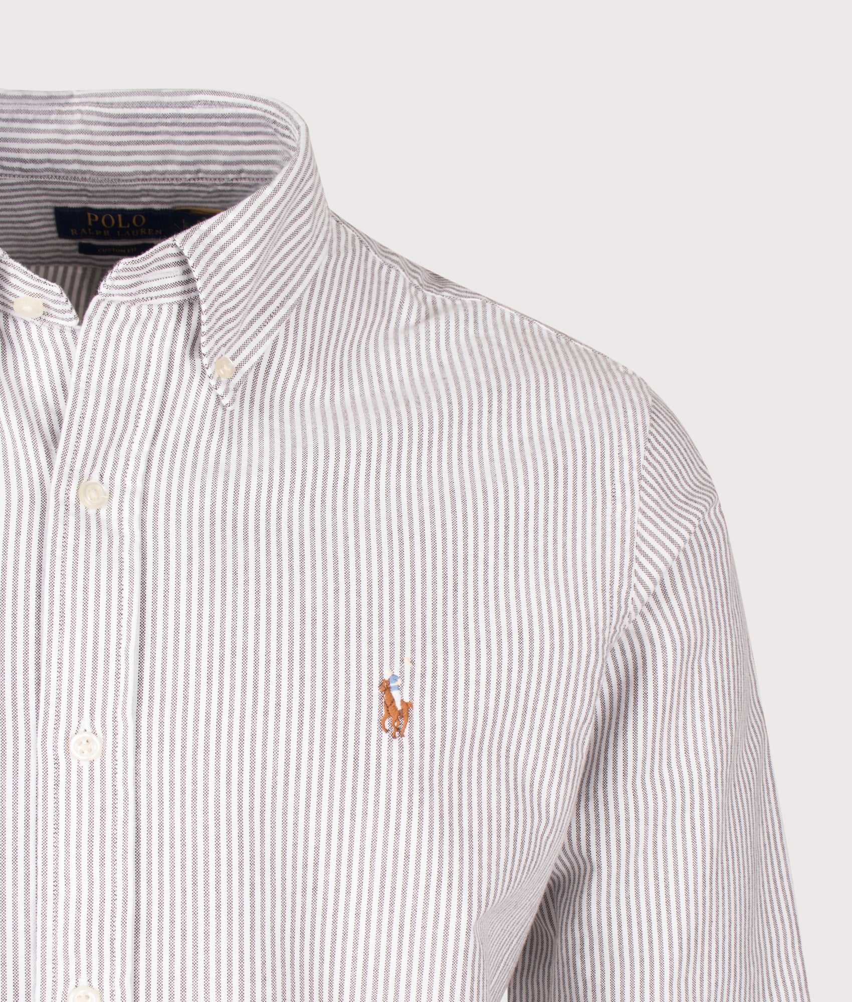 Polo Ralph Lauren Custom Fit Striped Oxford Shirt in Nutmeg Brown and White stripe at EQVVS Menswear. Detail shot.