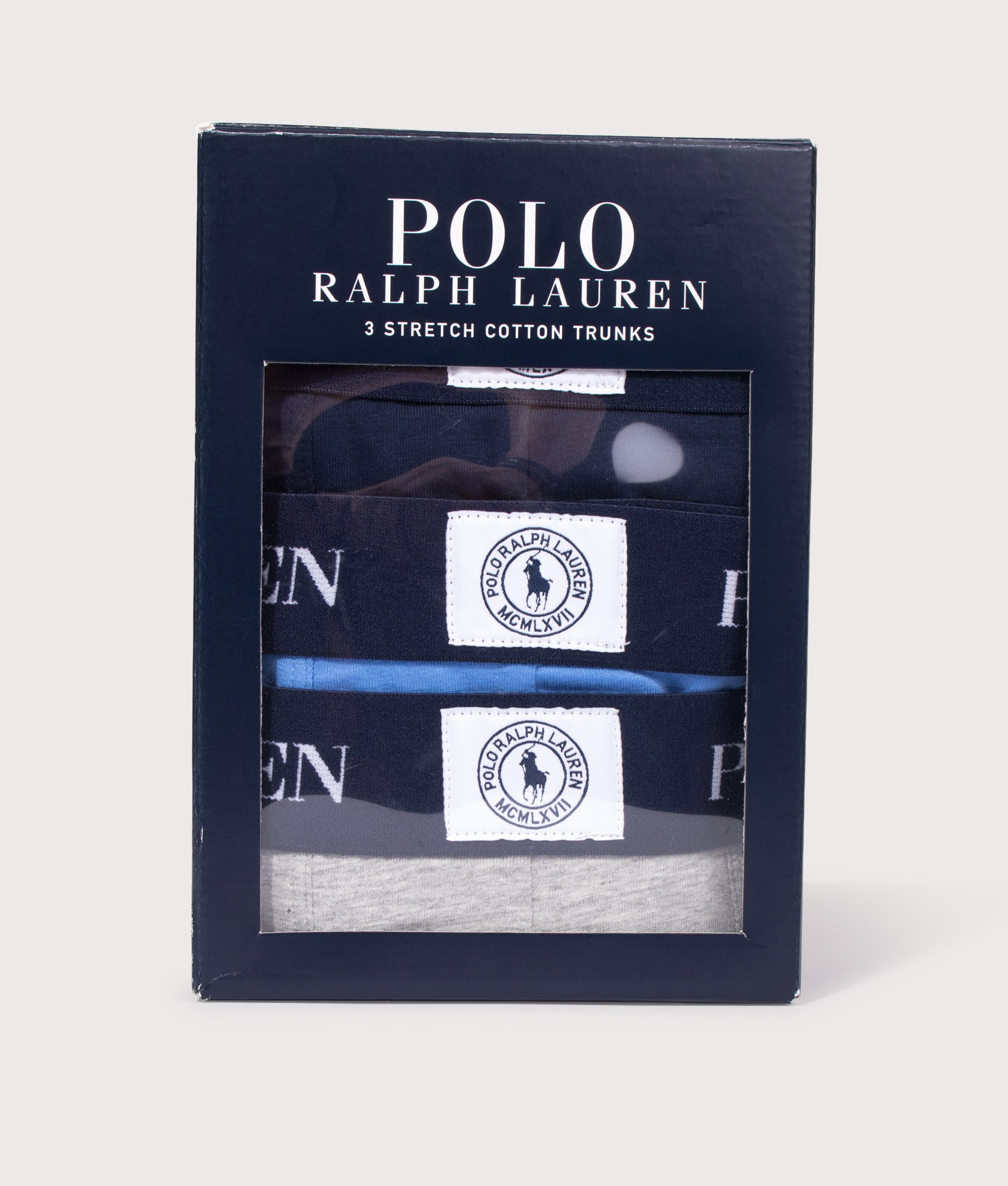 Polo Ralph Lauren 3 Pack Classic Stretch Cotton Trunks in Navy, Blue and Grey at EQVVS Menswear. Box shot.