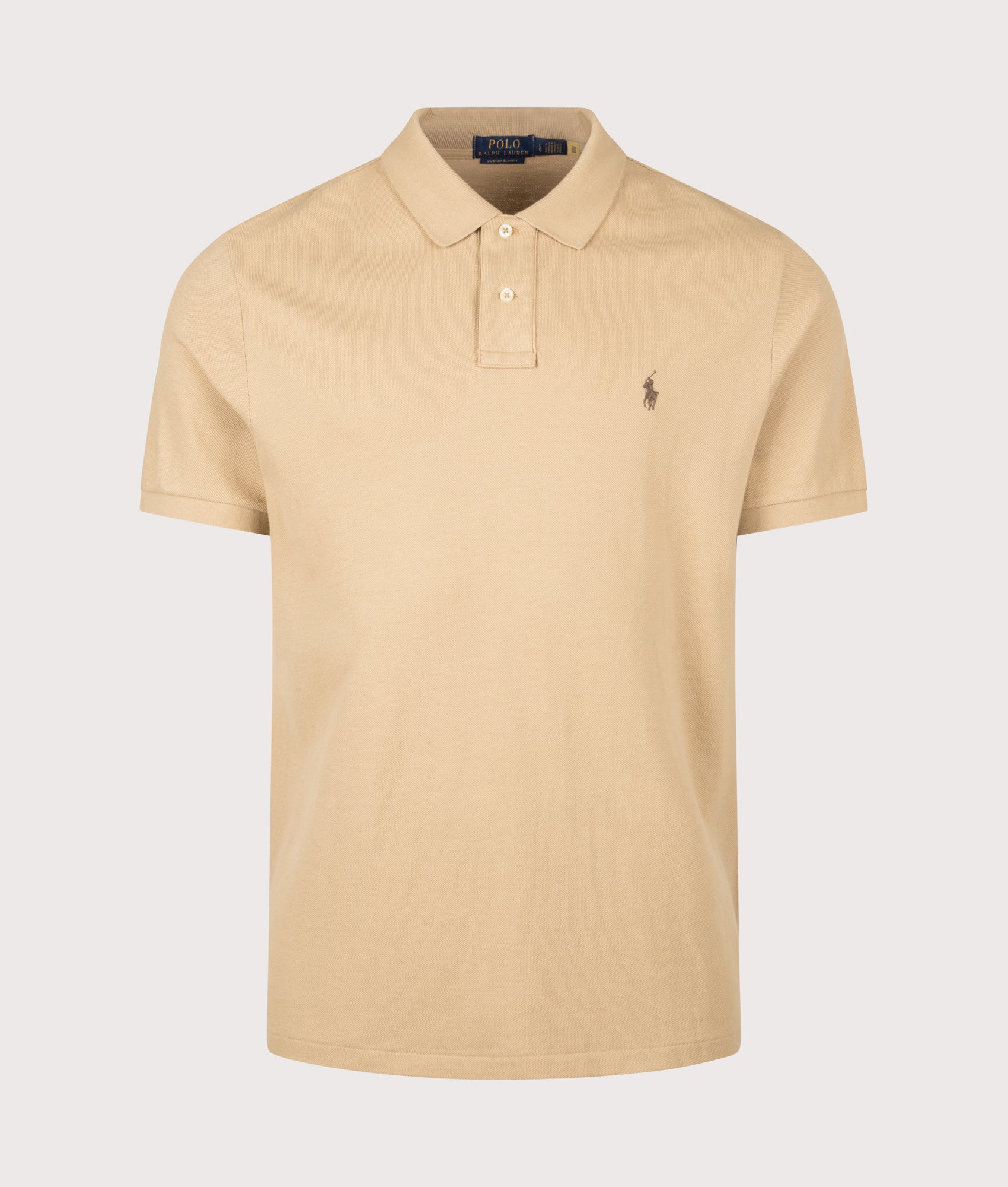 Polo Ralph Lauren Custom Slim Fit Mesh Polo Shirt in Vintage Khaki at EQVVS Menswear. Front shot.