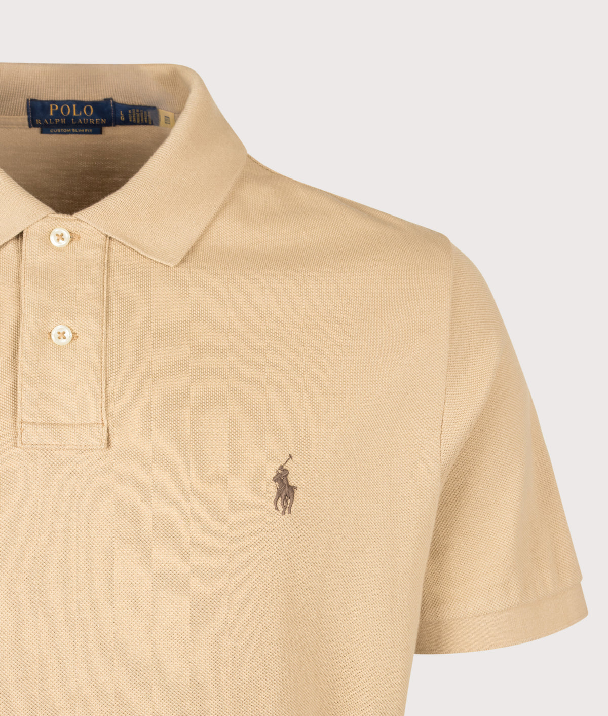 Polo Ralph Lauren Custom Slim Fit Mesh Polo Shirt in Vintage Khaki at EQVVS Menswear. Detail shot.