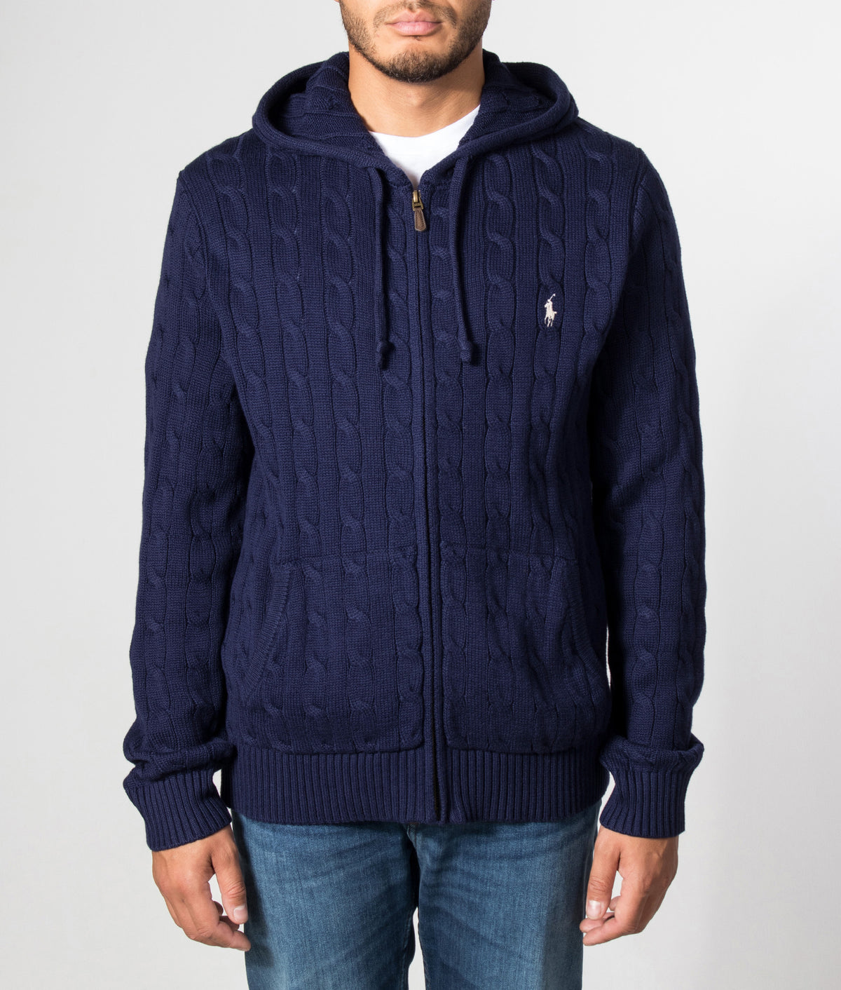 Polo Ralph Lauren Regular Fit Zip Through Cable Knitted Hoodie in Bright Navy at EQVVS Menswear. Model front shot.