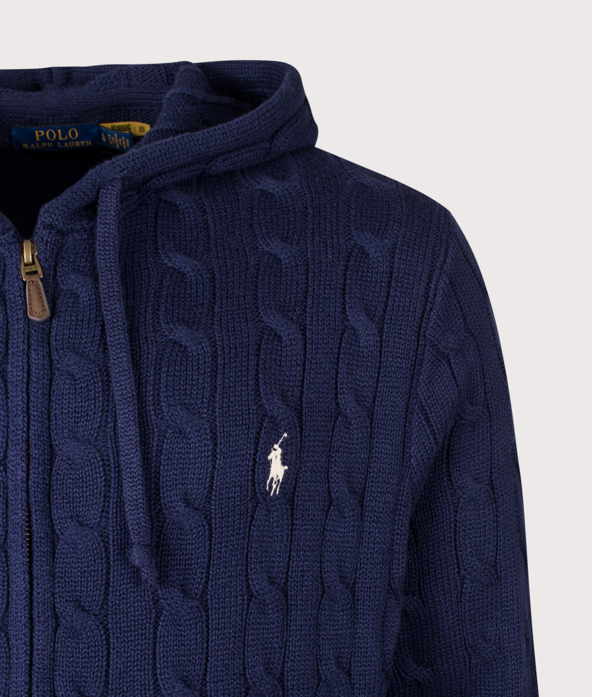 Polo Ralph Lauren Regular Fit Zip Through Cable Knitted Hoodie in Bright Navy at EQVVS Menswear. Detail shot.
